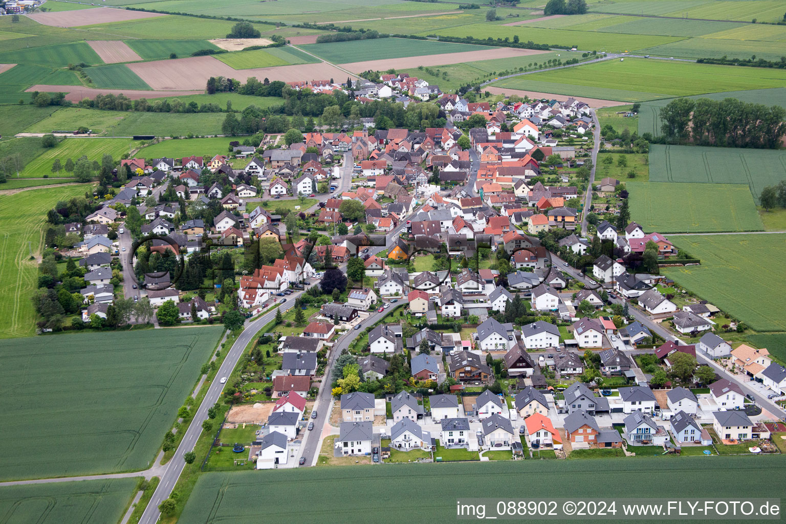 Aerial view of Construction sites for new construction residential area of detached housing estate Buergermeister Tempel Strasse in the district Harpertshausen in Babenhausen in the state Hesse, Germany