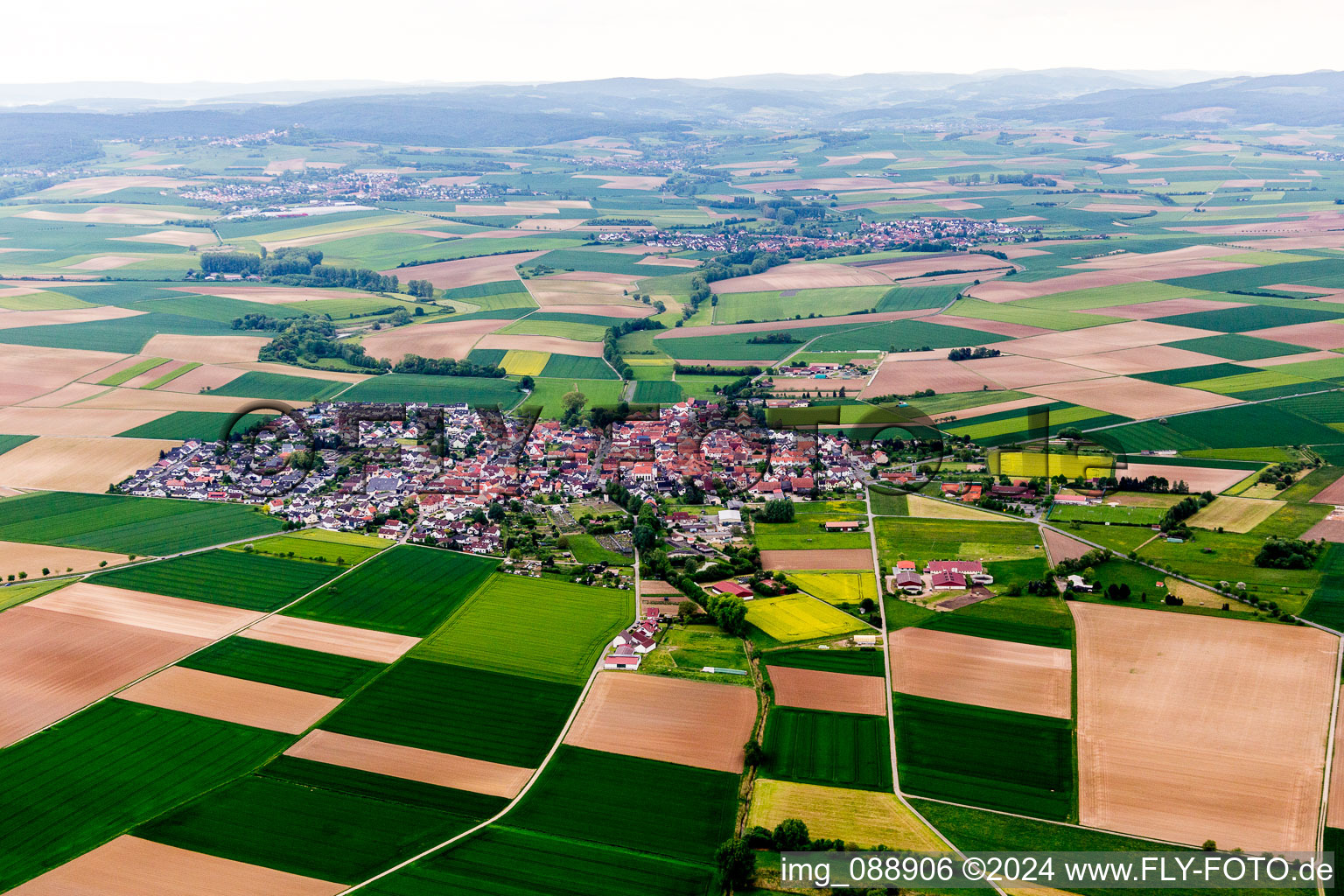 Aerial view of Village - view on the edge of agricultural fields and farmland in Gross-Umstadt in the state Hesse, Germany