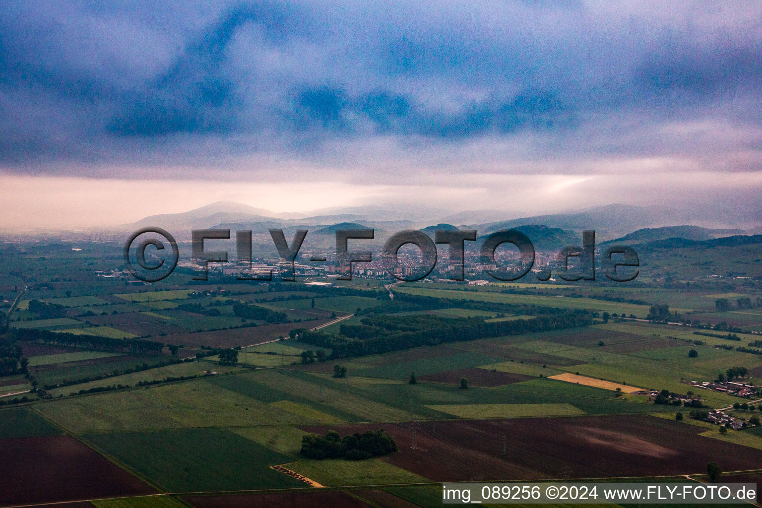 Mountains on the edge of the Odenwald in morning mist in Heppenheim in the state Hesse, Germany