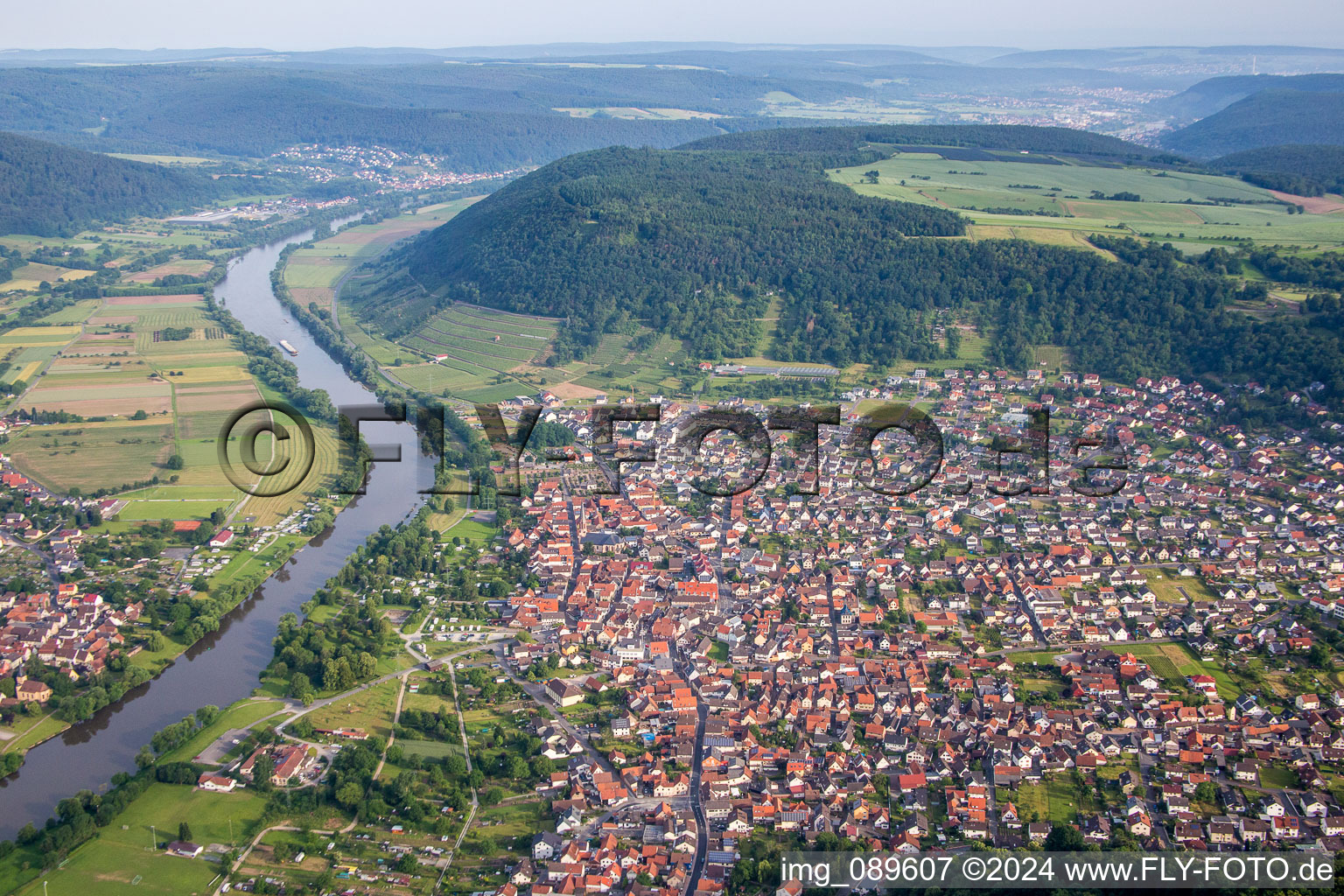 Aerial view of Village on the banks of the area Main - river course in Grossheubach in the state Bavaria, Germany