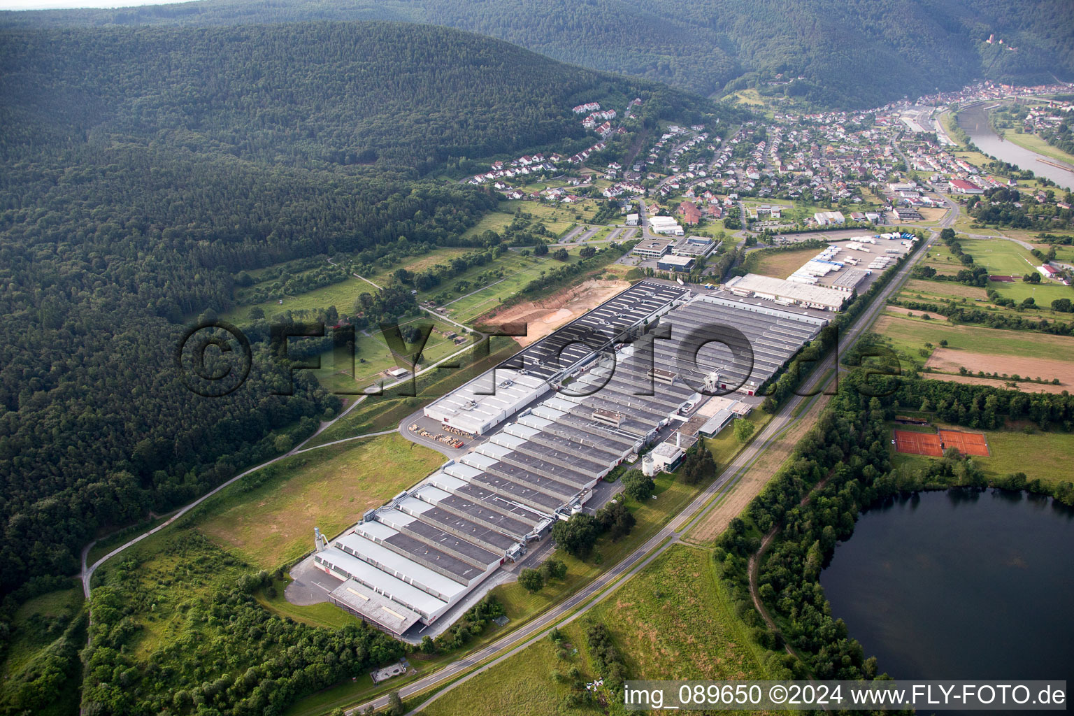 Aerial photograpy of Building and production halls on the premises of Rauch Moebelwerke GmbH in Freudenberg in the state Baden-Wurttemberg, Germany