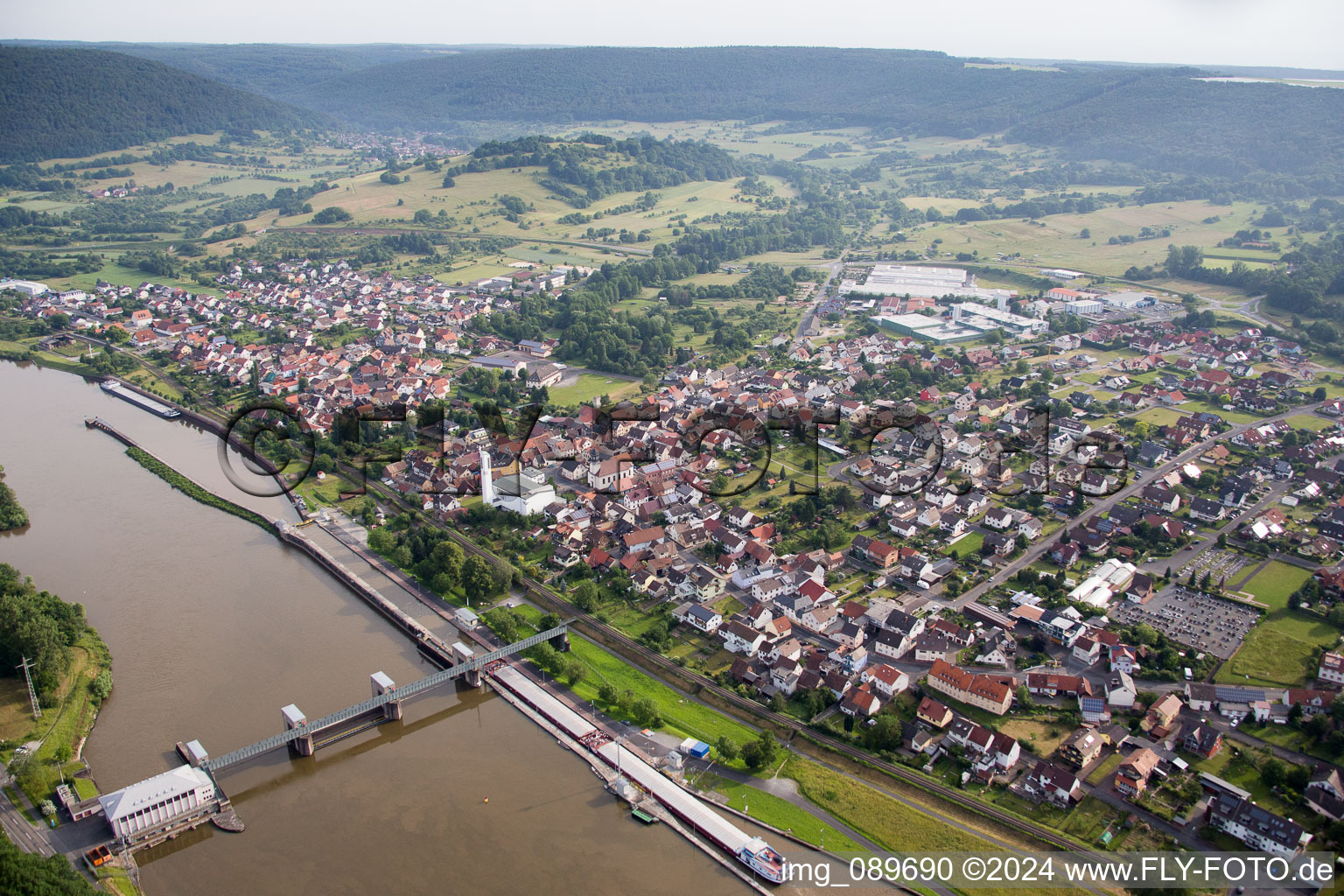 City center in the downtown area on the banks of river course of the Main river in Faulbach in the state Bavaria, Germany