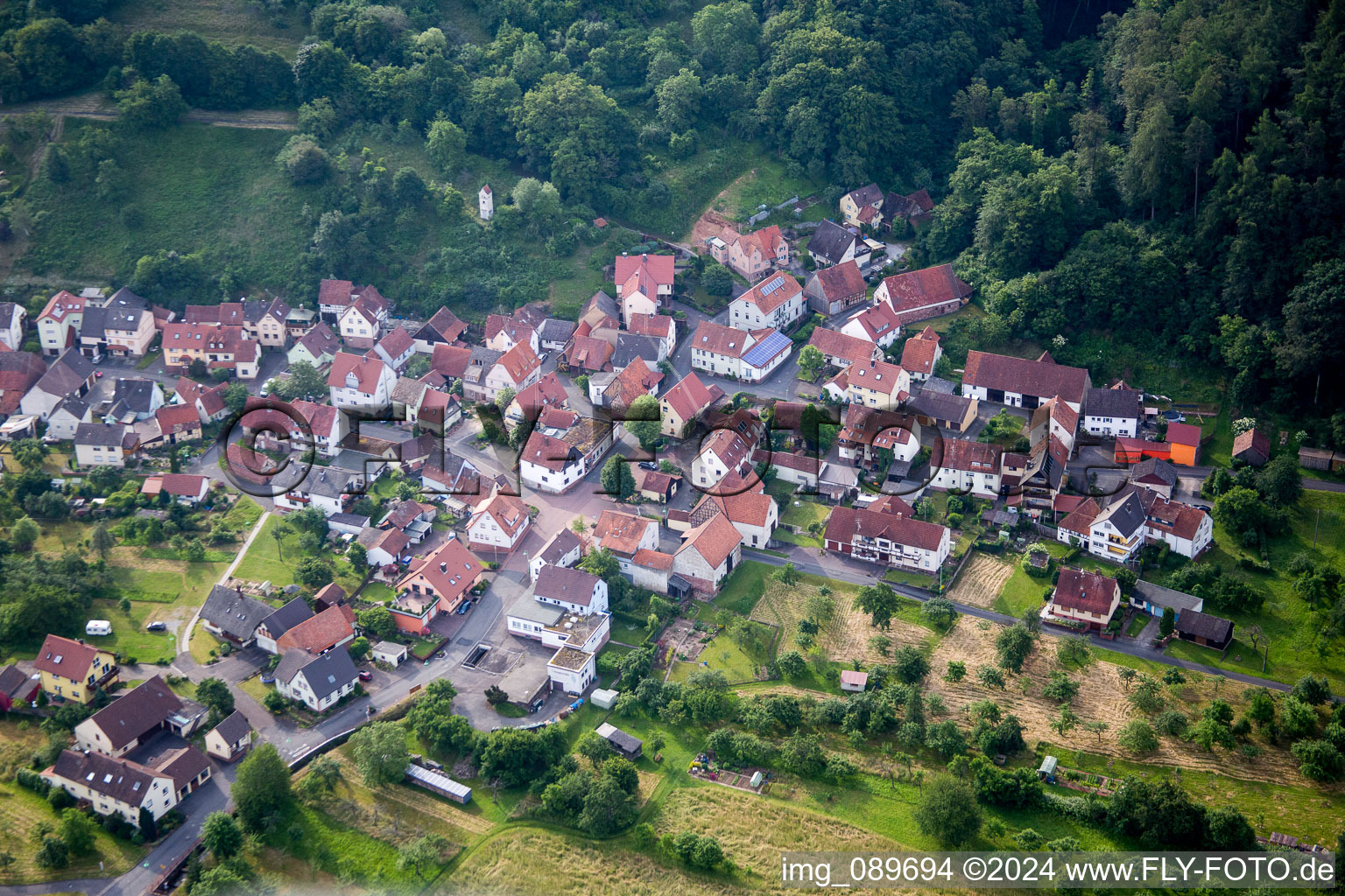 Aerial view of Village on the river bank areas of the Main river in the district Gruenenwoert in Wertheim in the state Baden-Wurttemberg, Germany