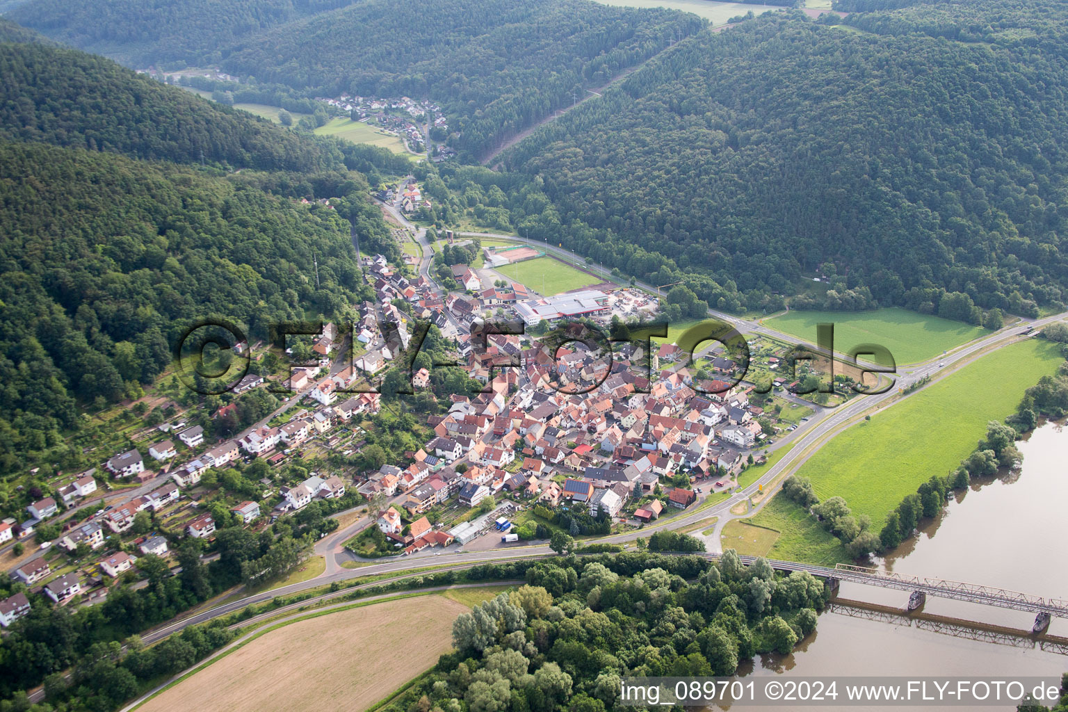 Aerial view of Village on the river bank areas of the Main river in Hasloch in the state Bavaria, Germany