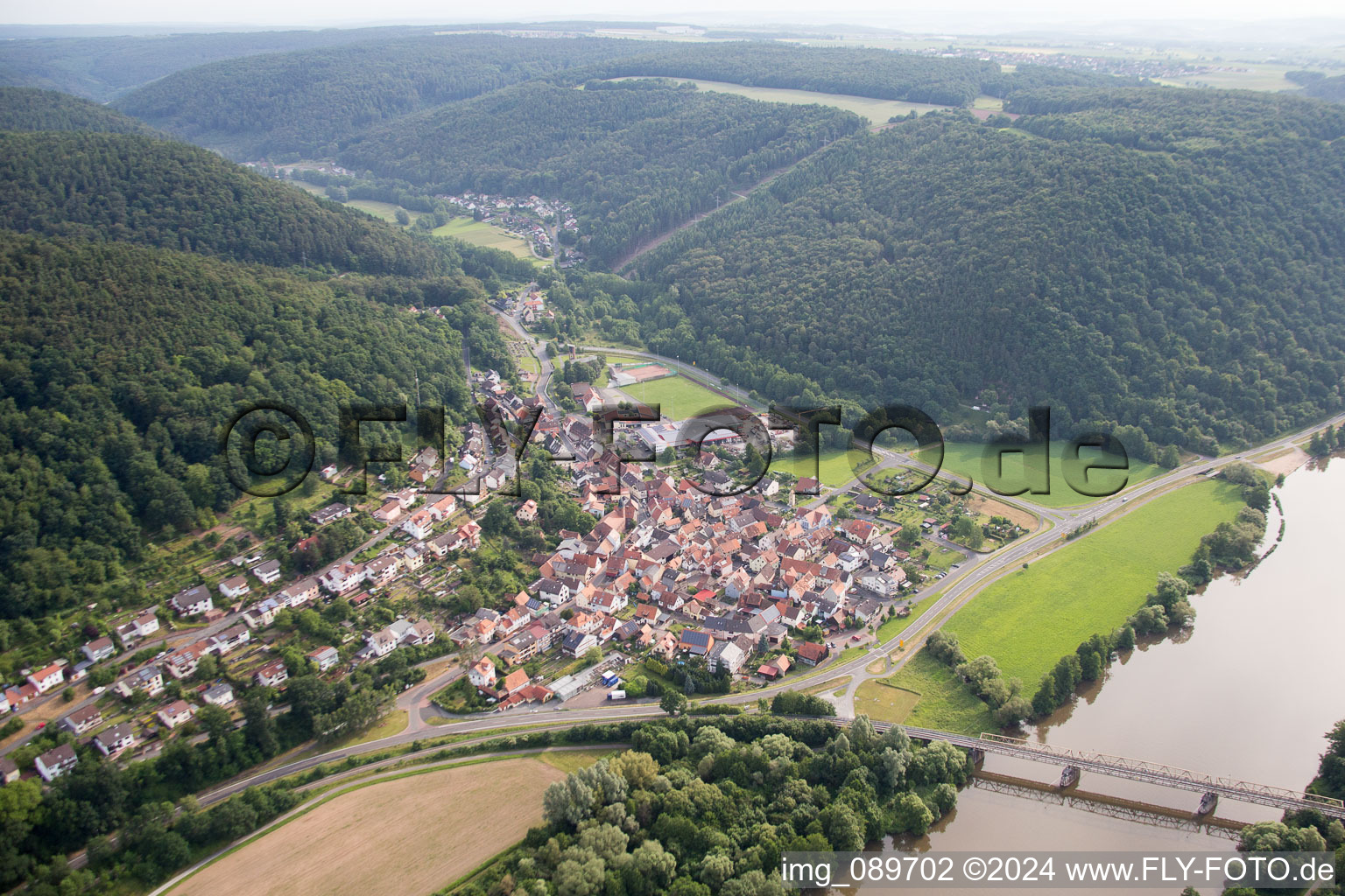 Aerial photograpy of Village on the river bank areas of the Main river in Hasloch in the state Bavaria, Germany