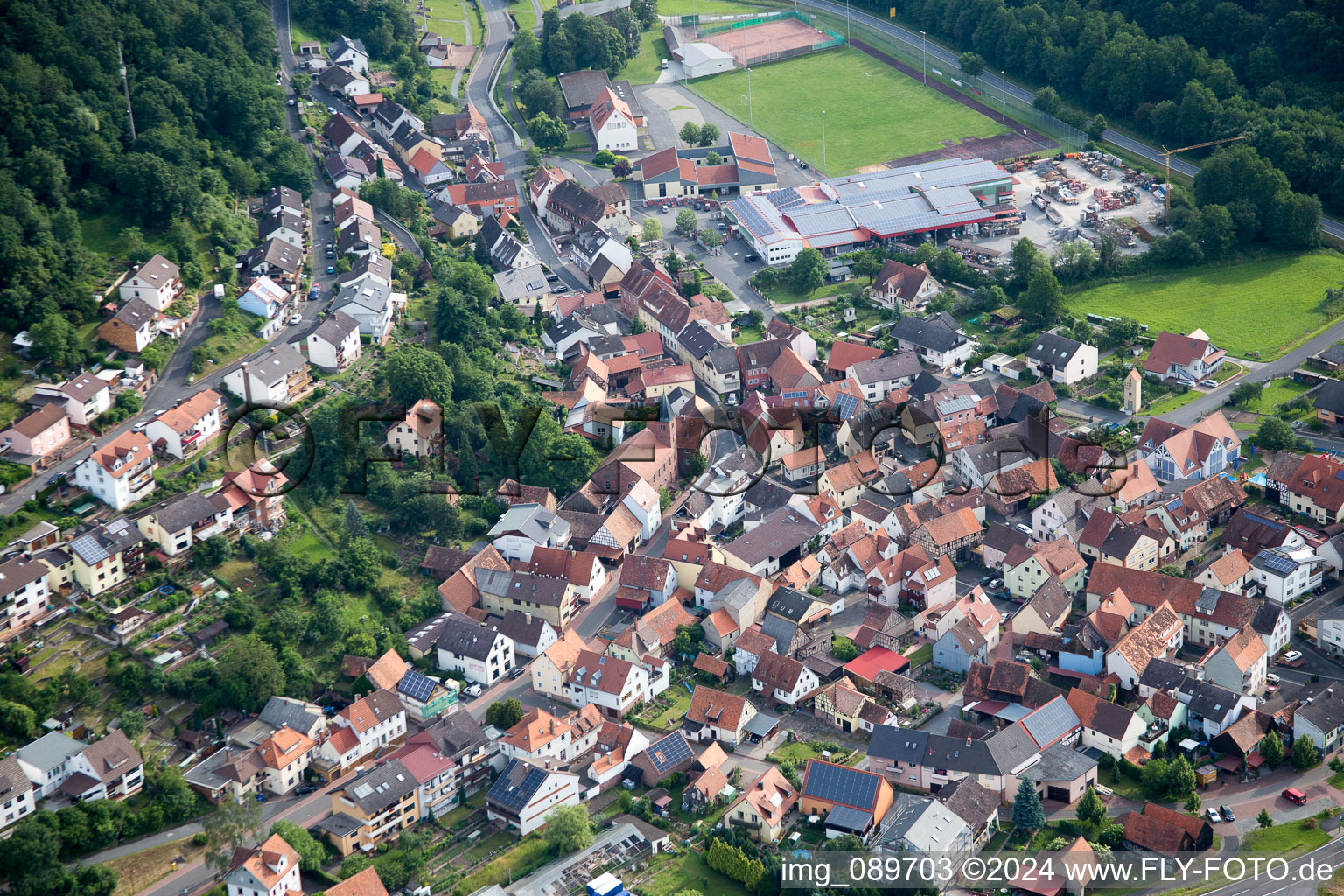 Oblique view of Village on the river bank areas of the Main river in Hasloch in the state Bavaria, Germany