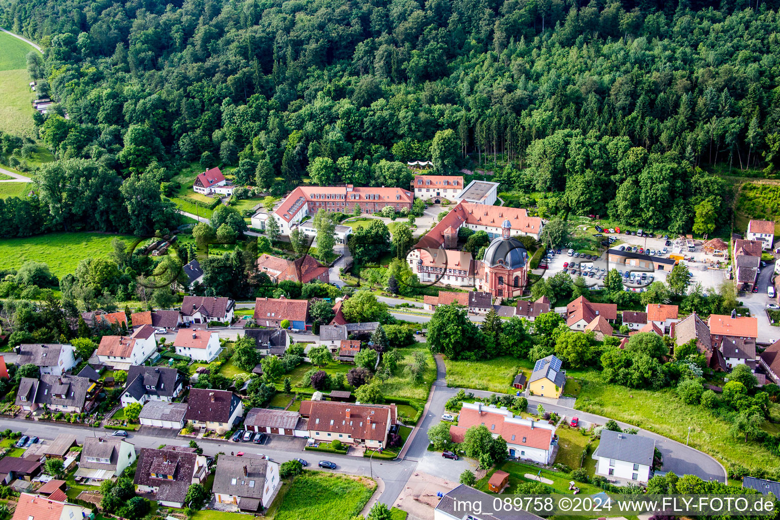 Aerial view of Building complex of the former monastery and today Benediktushof - Zentrum fuer Meditation and Achtsamkeit Seminar- and Tagungszentrum GmbH in Holzkirchen in the state Bavaria, Germany