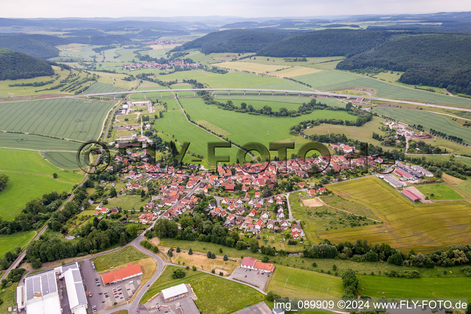 Village - view on the edge of agricultural fields and farmland in Einhausen in the state Thuringia, Germany