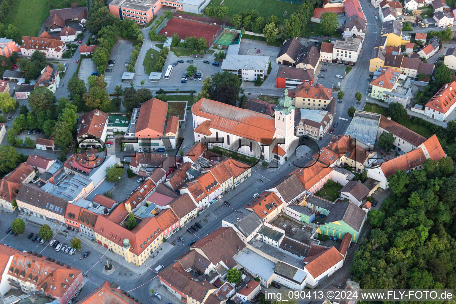 Aerial view of Church building in of Stadtpfarrkirche St . Maria Old Town- center of downtown in Landau an der Isar in the state Bavaria, Germany