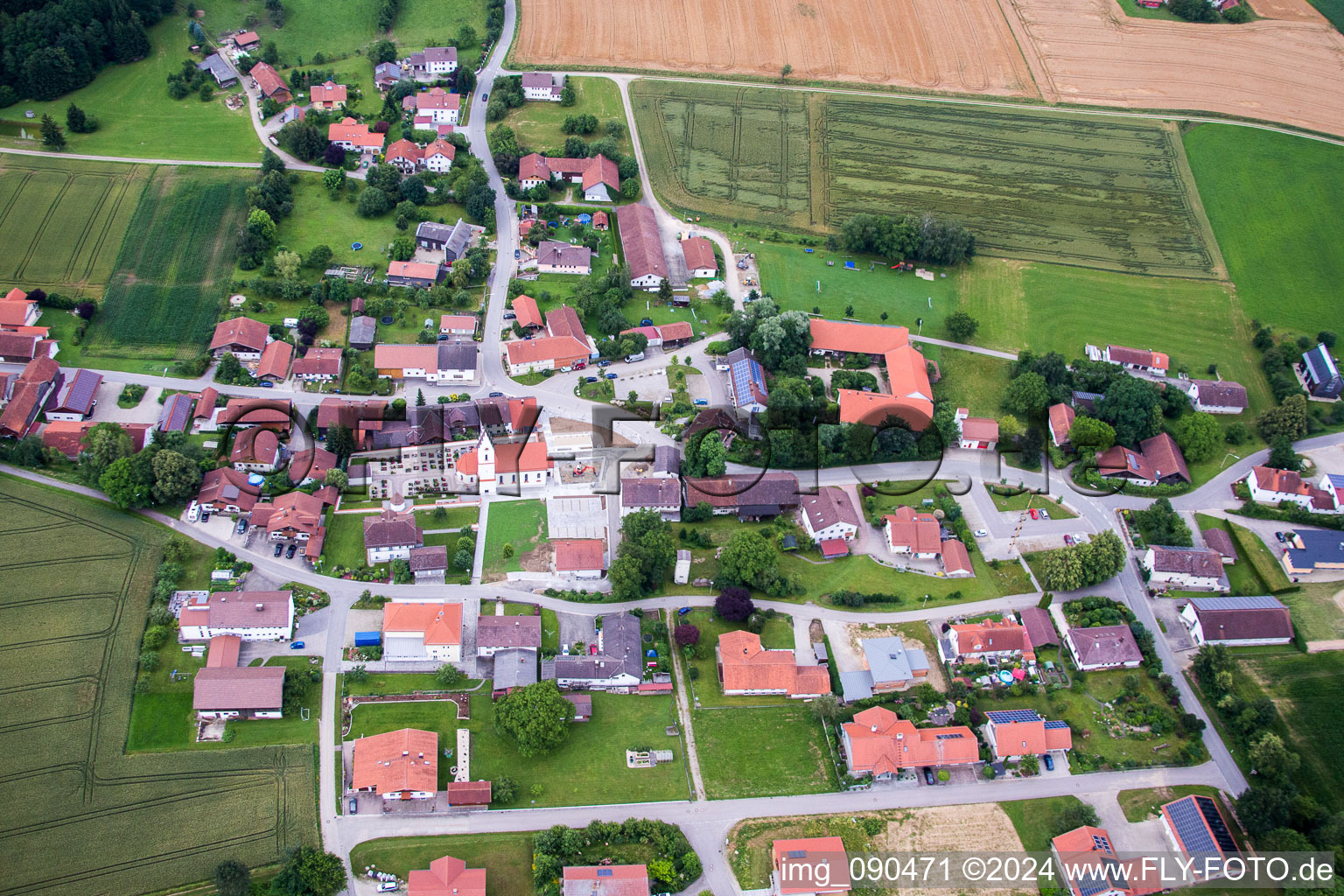 Village - view on the edge of agricultural fields and farmland in the district Rattenbach in Rimbach in the state Bavaria, Germany