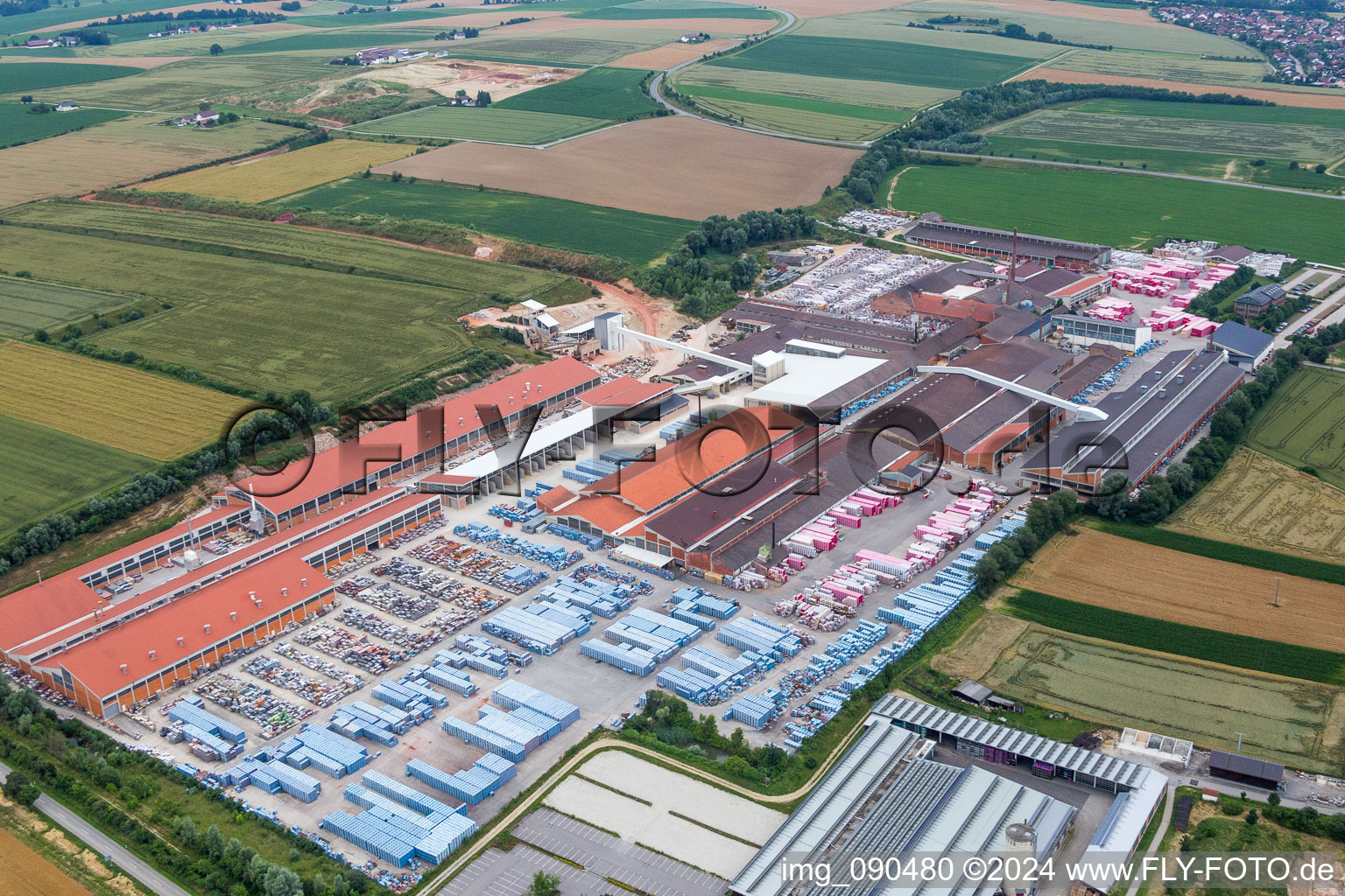 Aerial view of Building and production halls on the premises of Moeding Keramikfassaden GmbH in Marklkofen in the state Bavaria, Germany