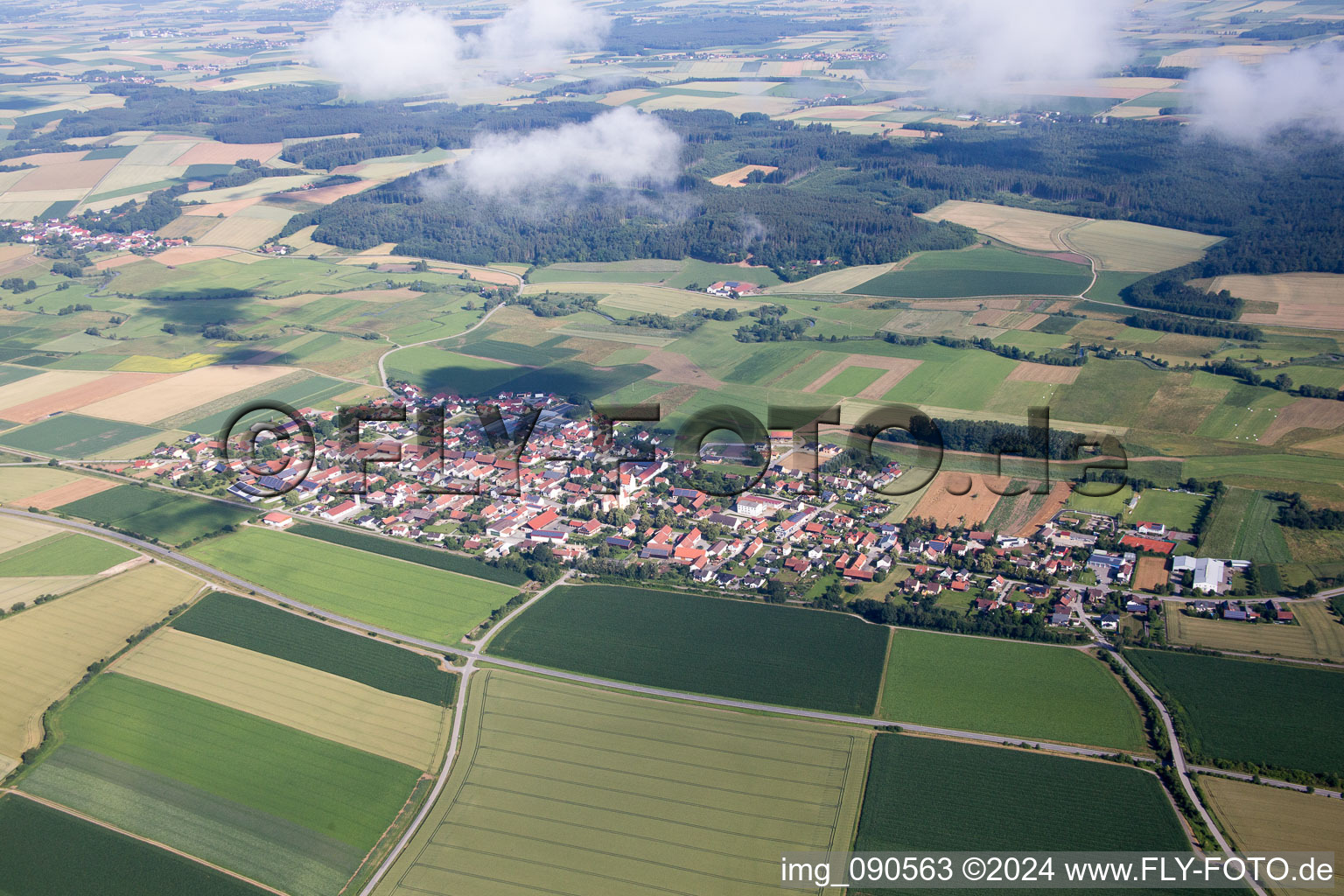 Town View of the streets and houses below clouds of the residential areas in Geiselhoering in the state Bavaria