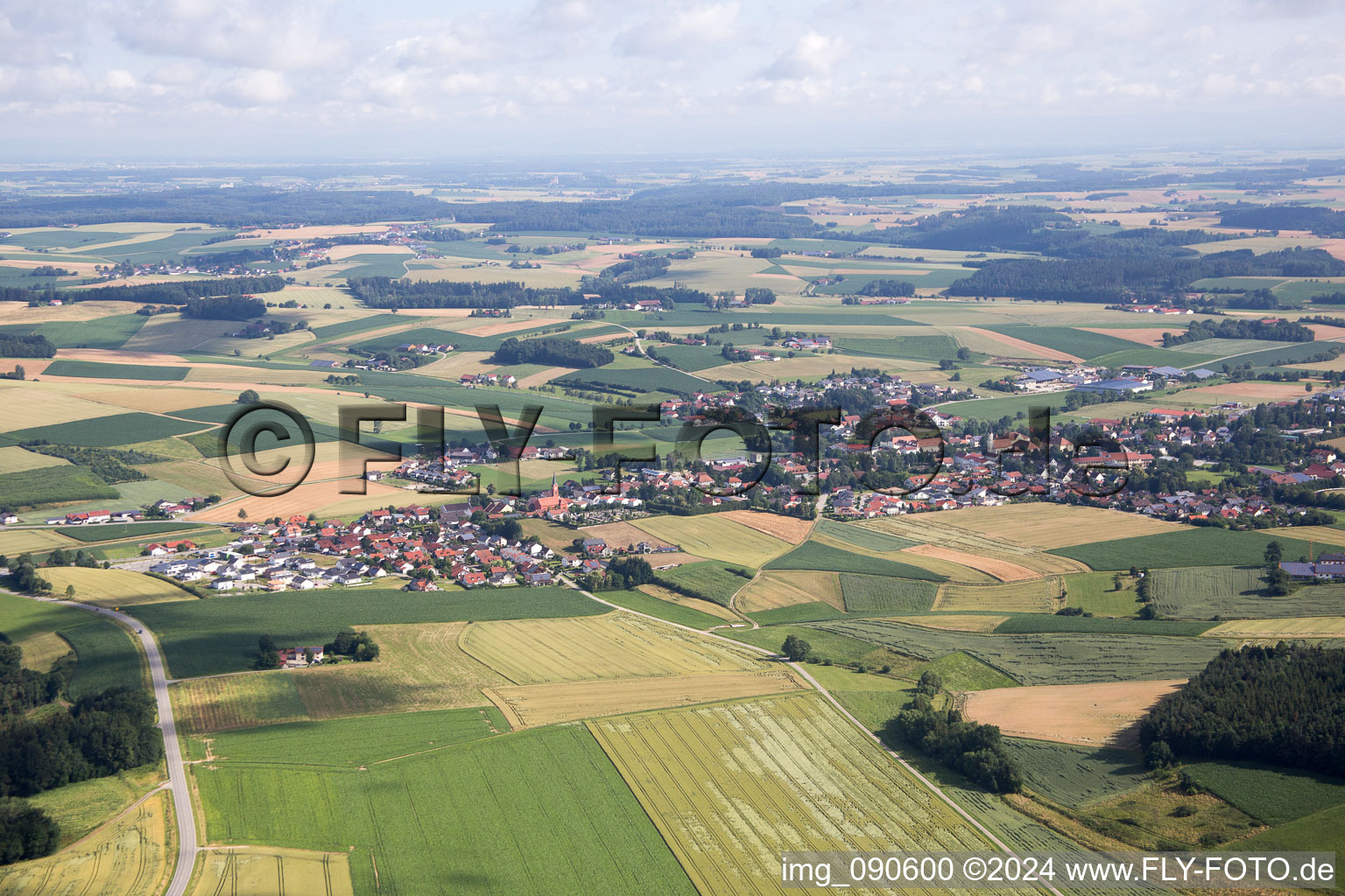 Village - view on the edge of agricultural fields and farmland in Mengkofen in the state Bavaria, Germany