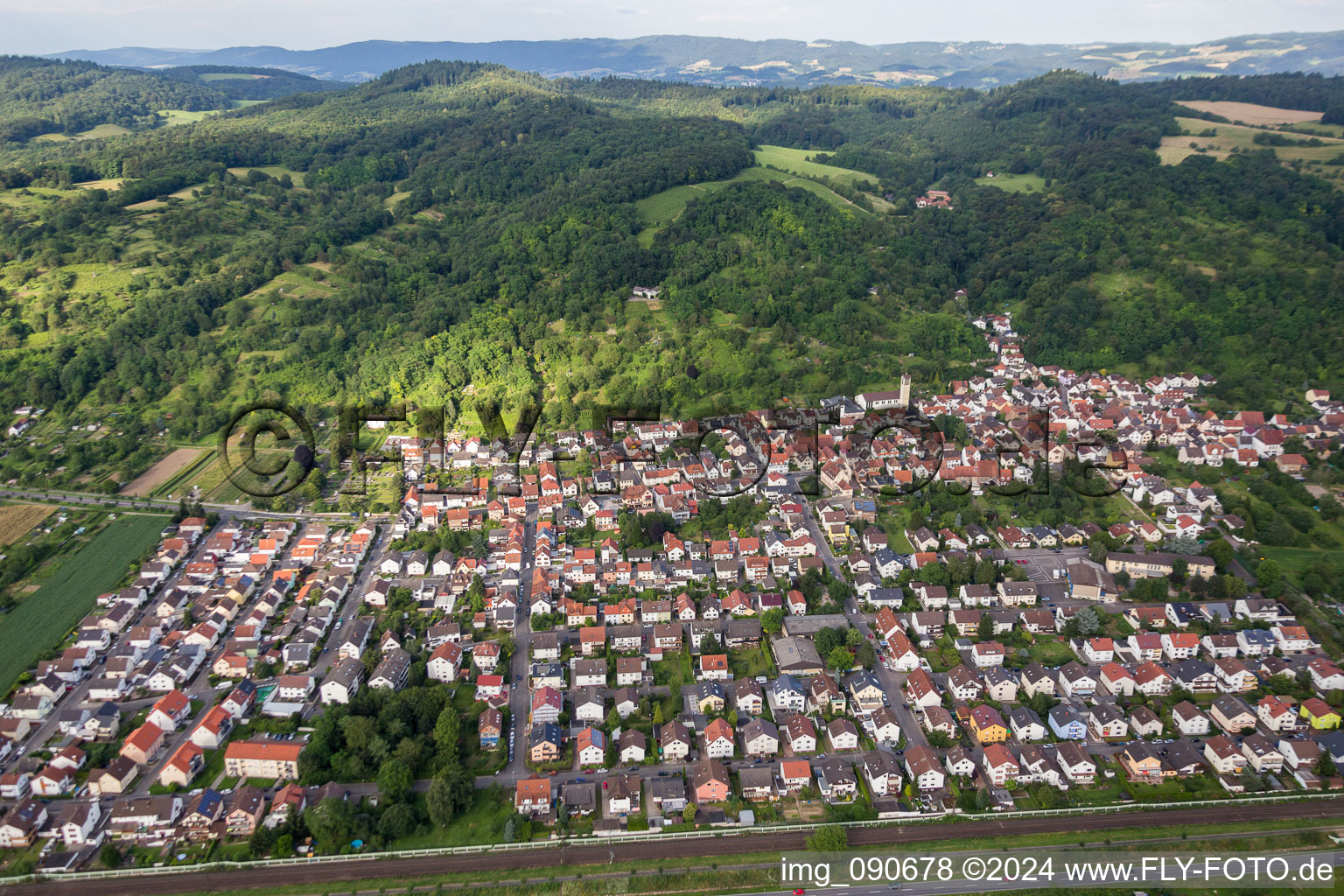 Aerial view of Village - view on the edge of agricultural fields and farmland in Sulzbach in the state Baden-Wurttemberg, Germany