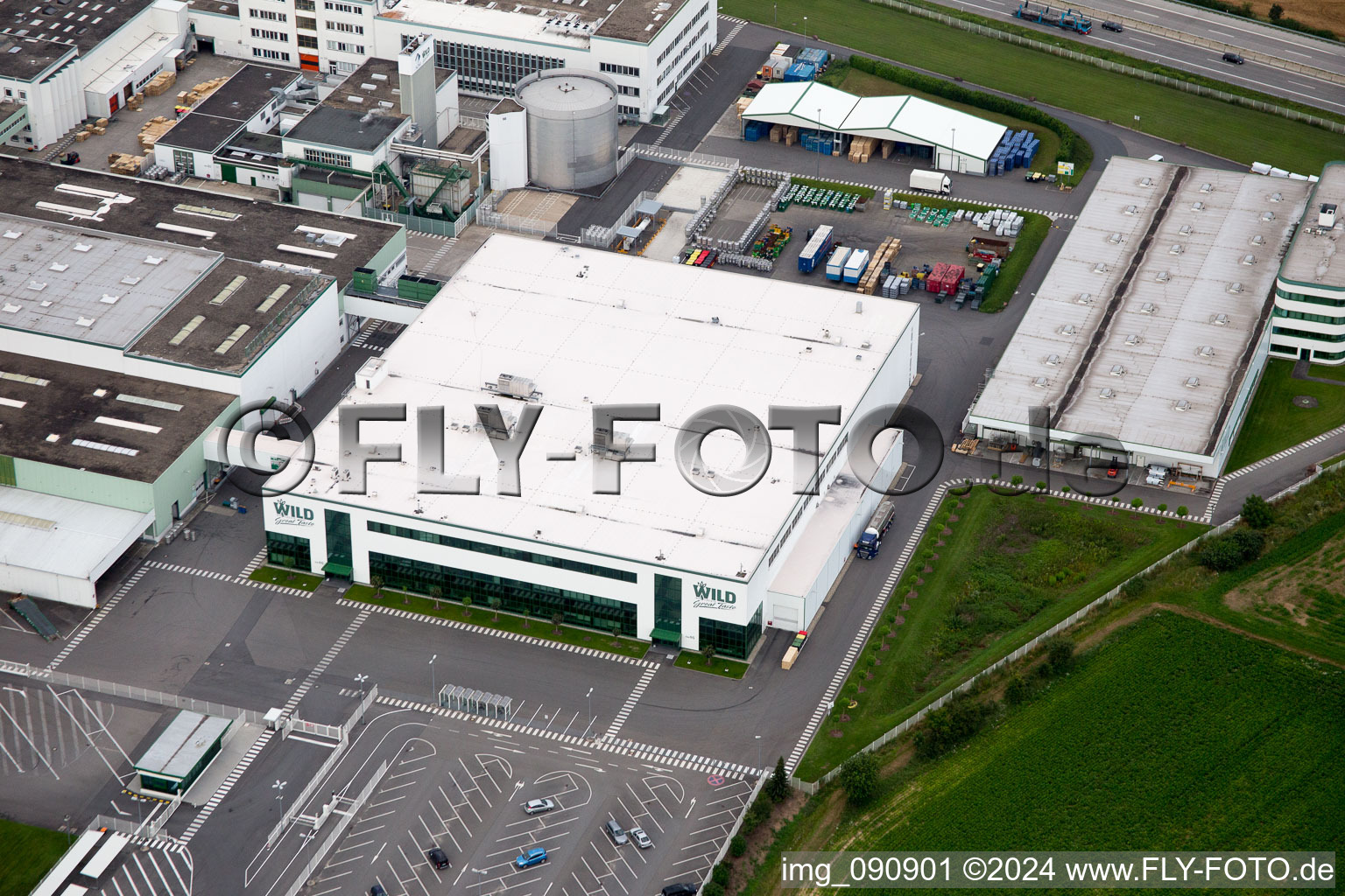 Oblique view of Building and production halls on the premises of Rudolf Wild GmbH & Co. KG (Capri-Sonne) in Eppelheim in the state Baden-Wurttemberg