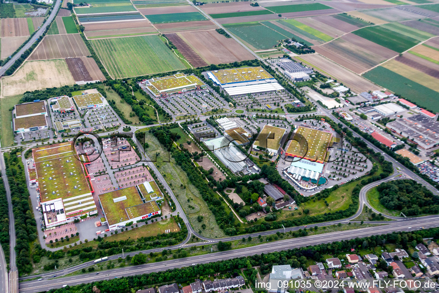 Aerial view of Building of the construction market BAUHAUS and Roller Furniture in the district Oggersheim in Ludwigshafen am Rhein in the state Rhineland-Palatinate, Germany