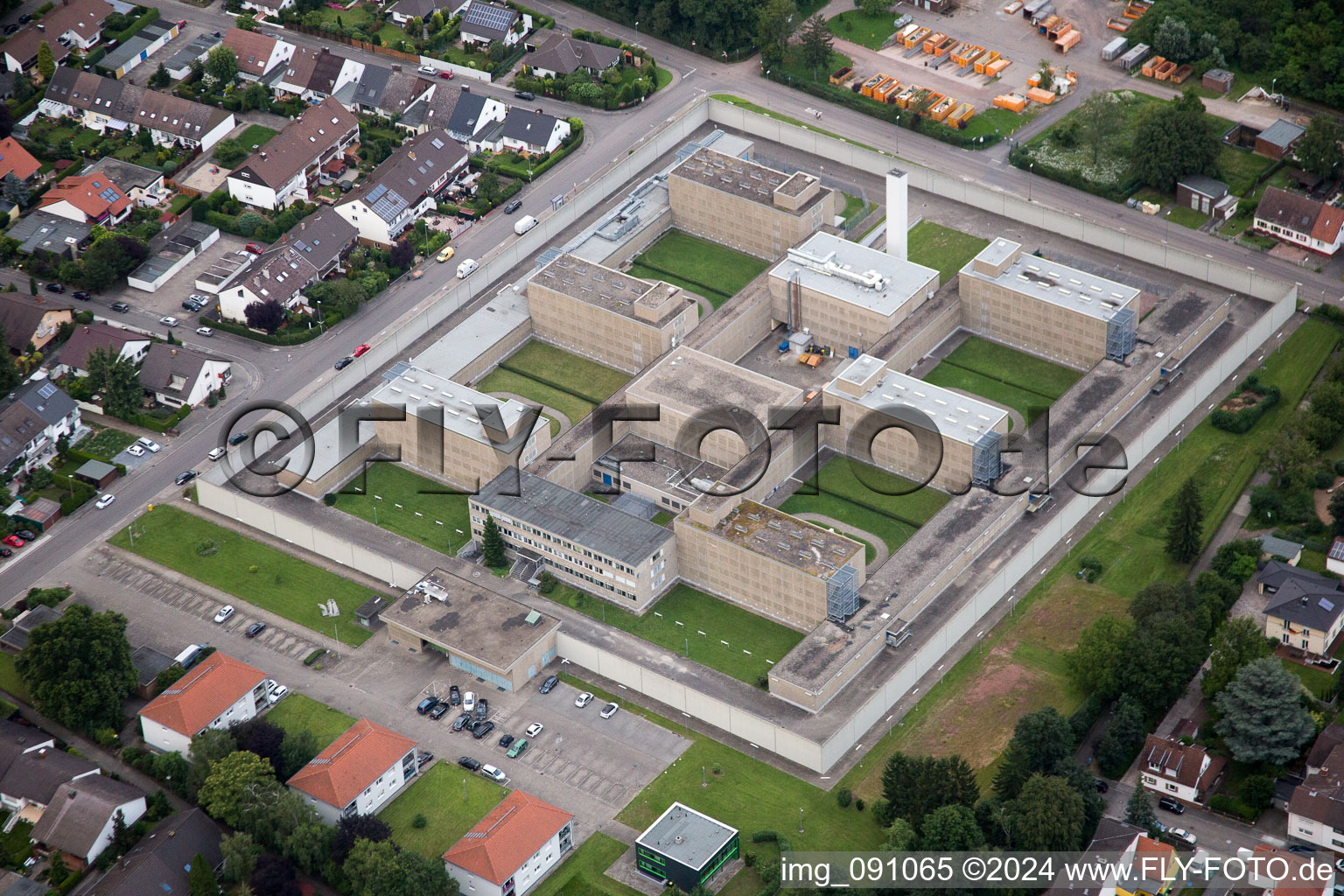 Surrounded by security fence premises of jail Justizvollzugsanstalt Frankenthal in Frankenthal (Pfalz) in the state Rhineland-Palatinate, Germany