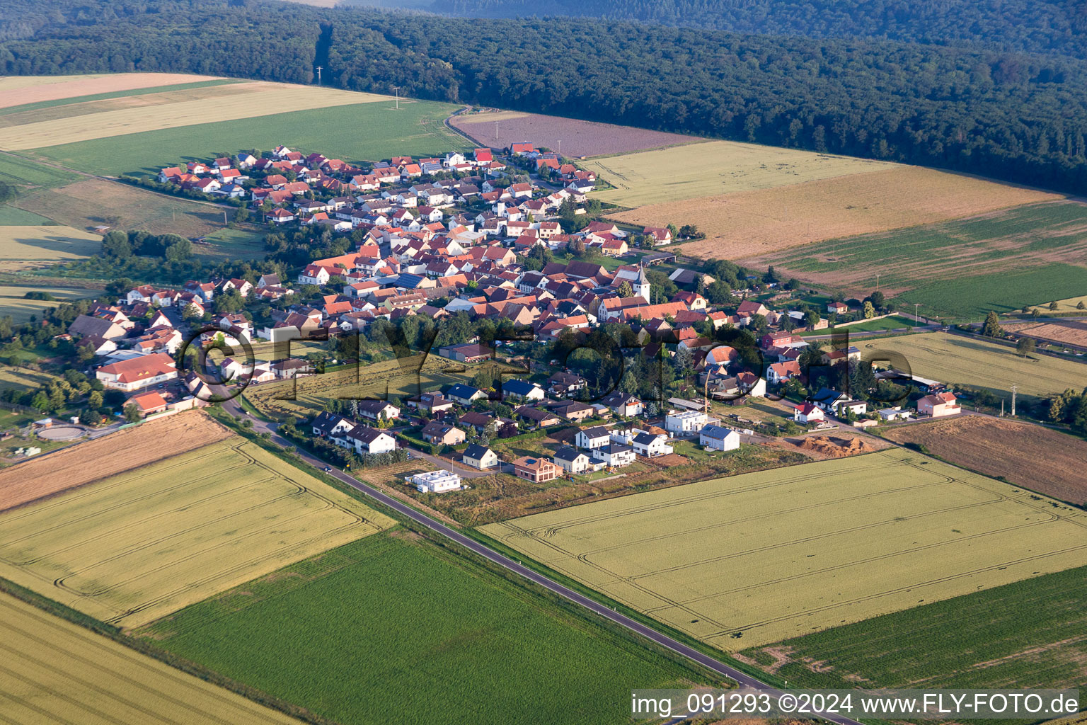 Aerial view of Village - view on the edge of agricultural fields and farmland in Orbis in the state Rhineland-Palatinate, Germany