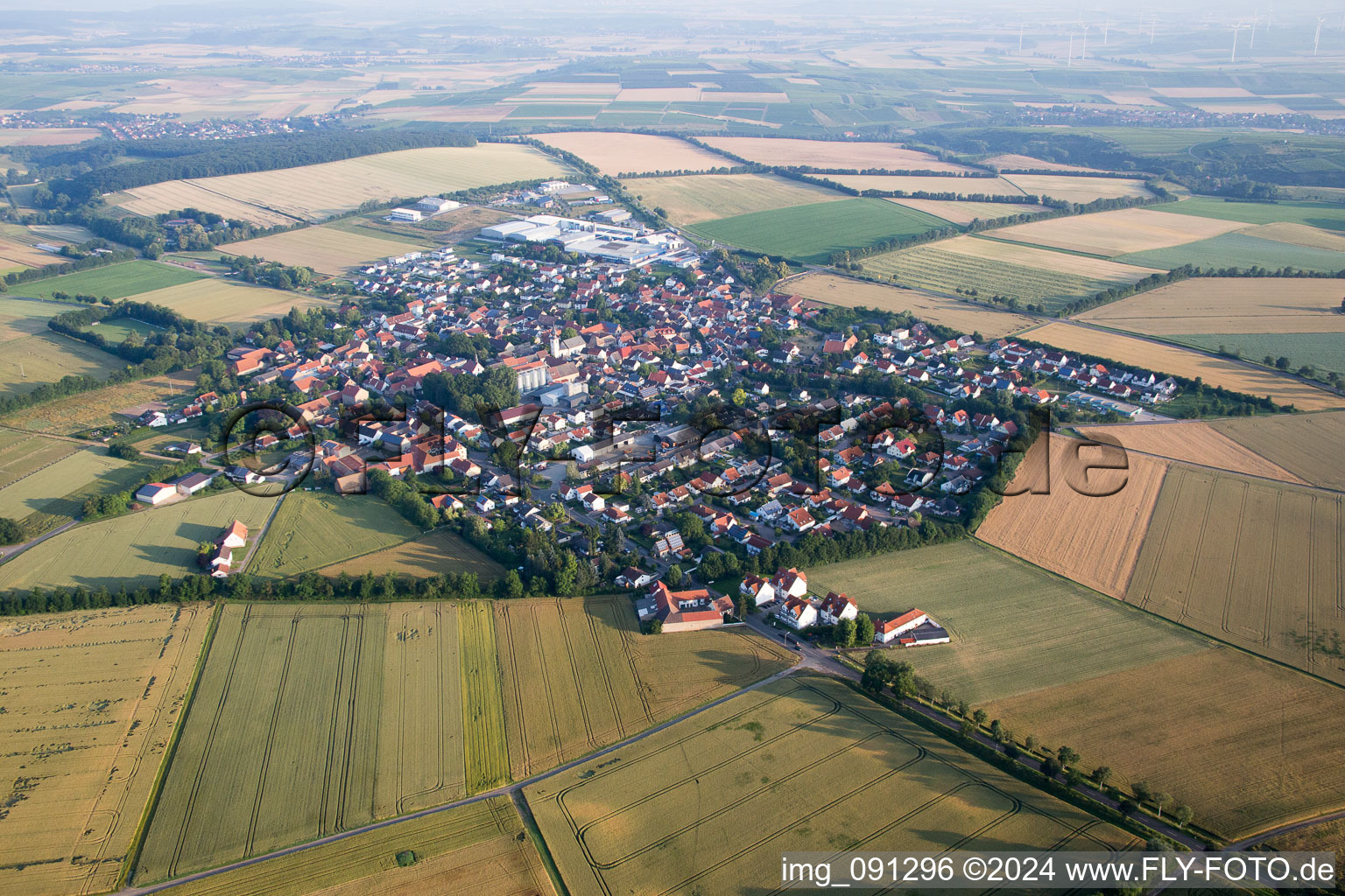 Village - view on the edge of agricultural fields and farmland in Erbes-Buedesheim in the state Rhineland-Palatinate
