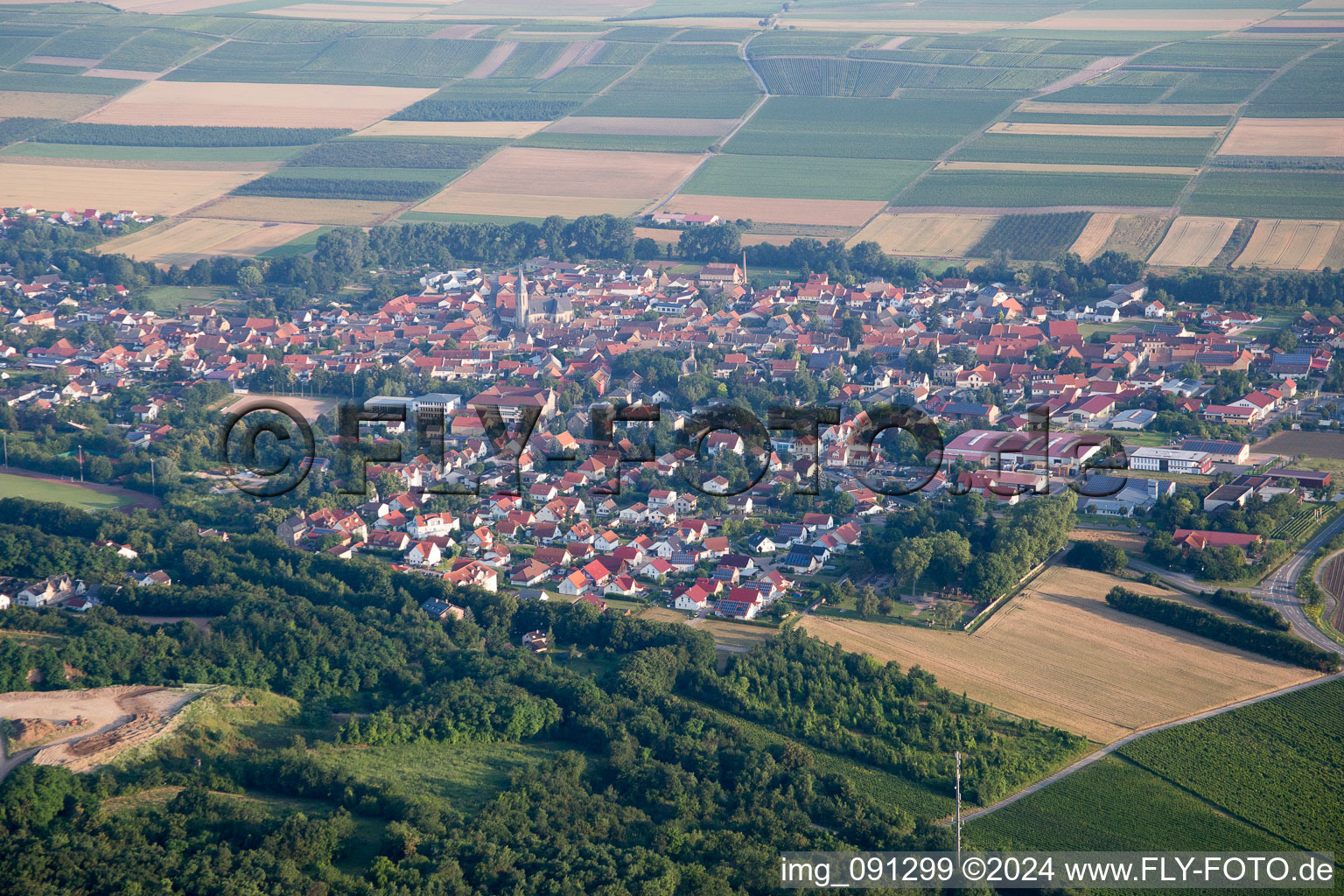 Village - view on the edge of agricultural fields and farmland in Flonheim in the state Rhineland-Palatinate, Germany