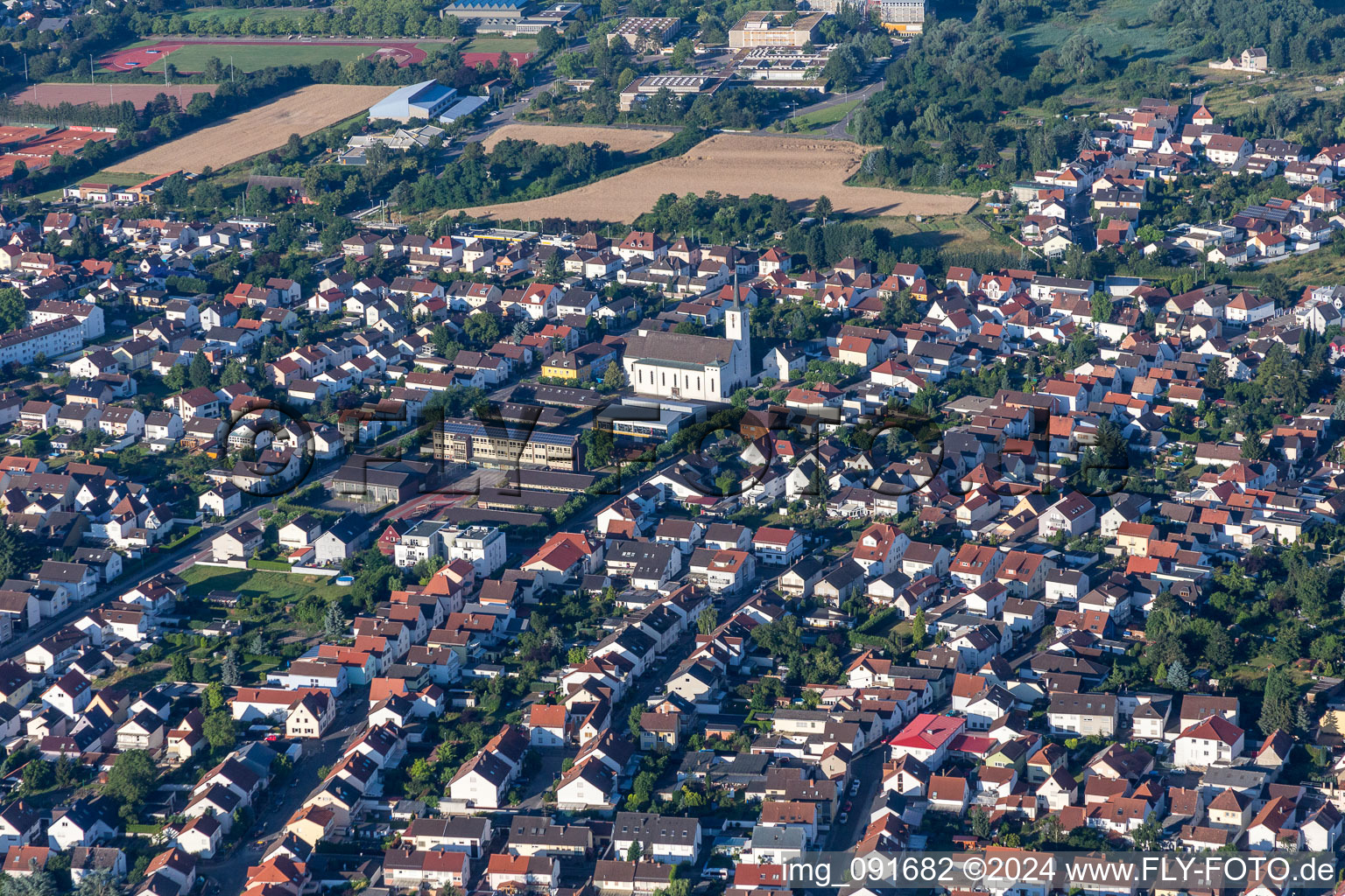 Aerial photograpy of City area with outside districts and inner city area in Schifferstadt in the state Rhineland-Palatinate, Germany