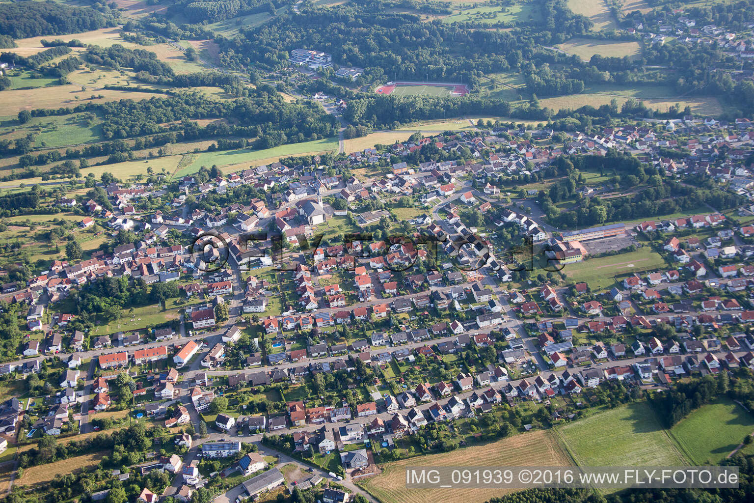 Aerial view of Town View of the streets and houses of the residential areas in Schoenenberg-Kuebelberg in the state Rhineland-Palatinate, Germany