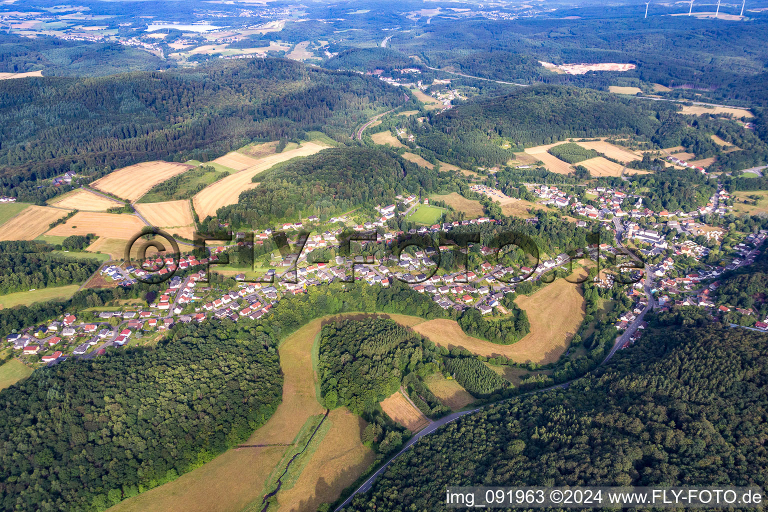 Village - view on the edge of agricultural fields and farmland in Nohfelden in the state Saarland, Germany