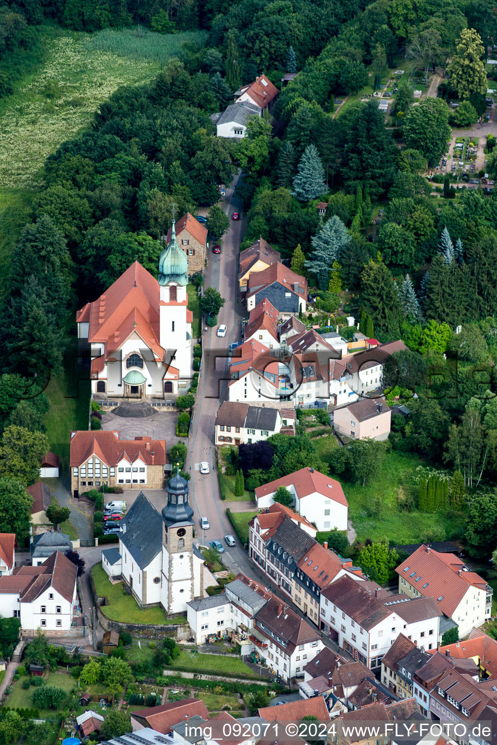 Aerial photograpy of Church building of catholic Church Herz Jesu in Winnweiler in the state Rhineland-Palatinate, Germany
