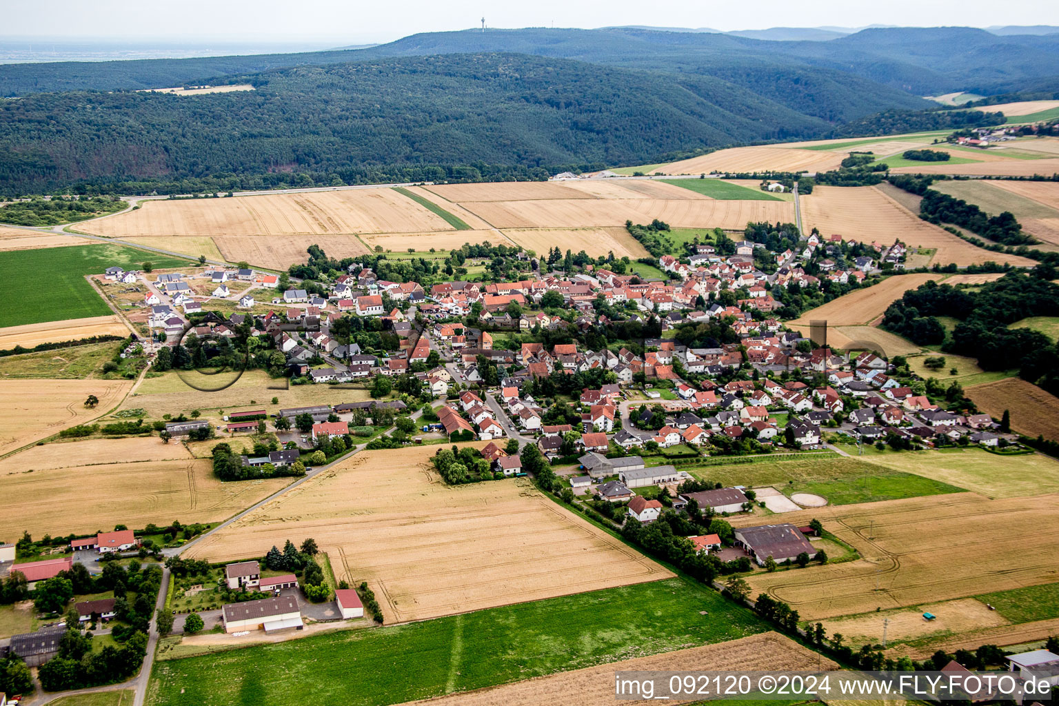 Village - view on the edge of agricultural fields and farmland in Tiefenthal in the state Rhineland-Palatinate, Germany