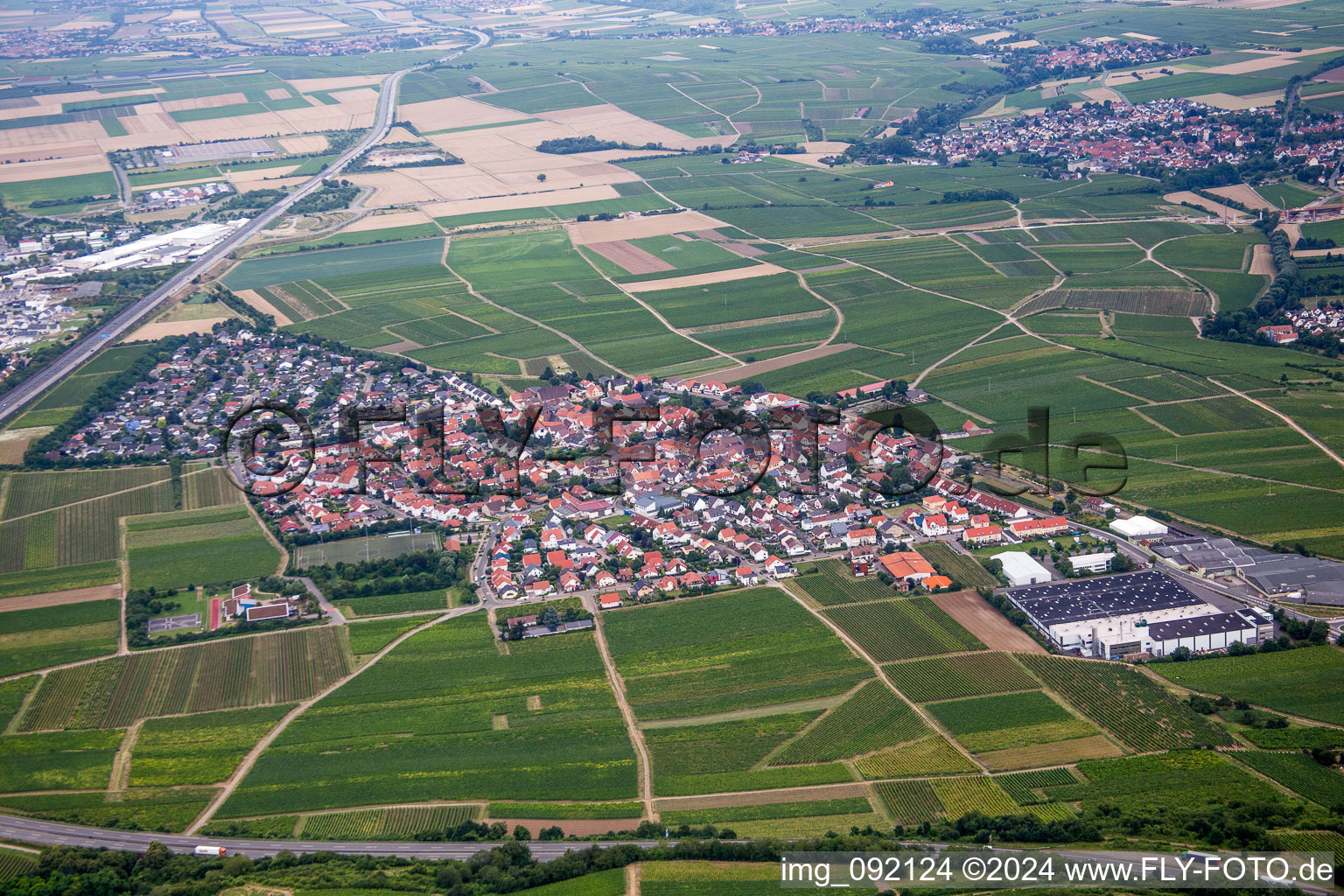 Aerial view of Village - view on the edge of agricultural fields and farmland in Tiefenthal in the state Rhineland-Palatinate, Germany