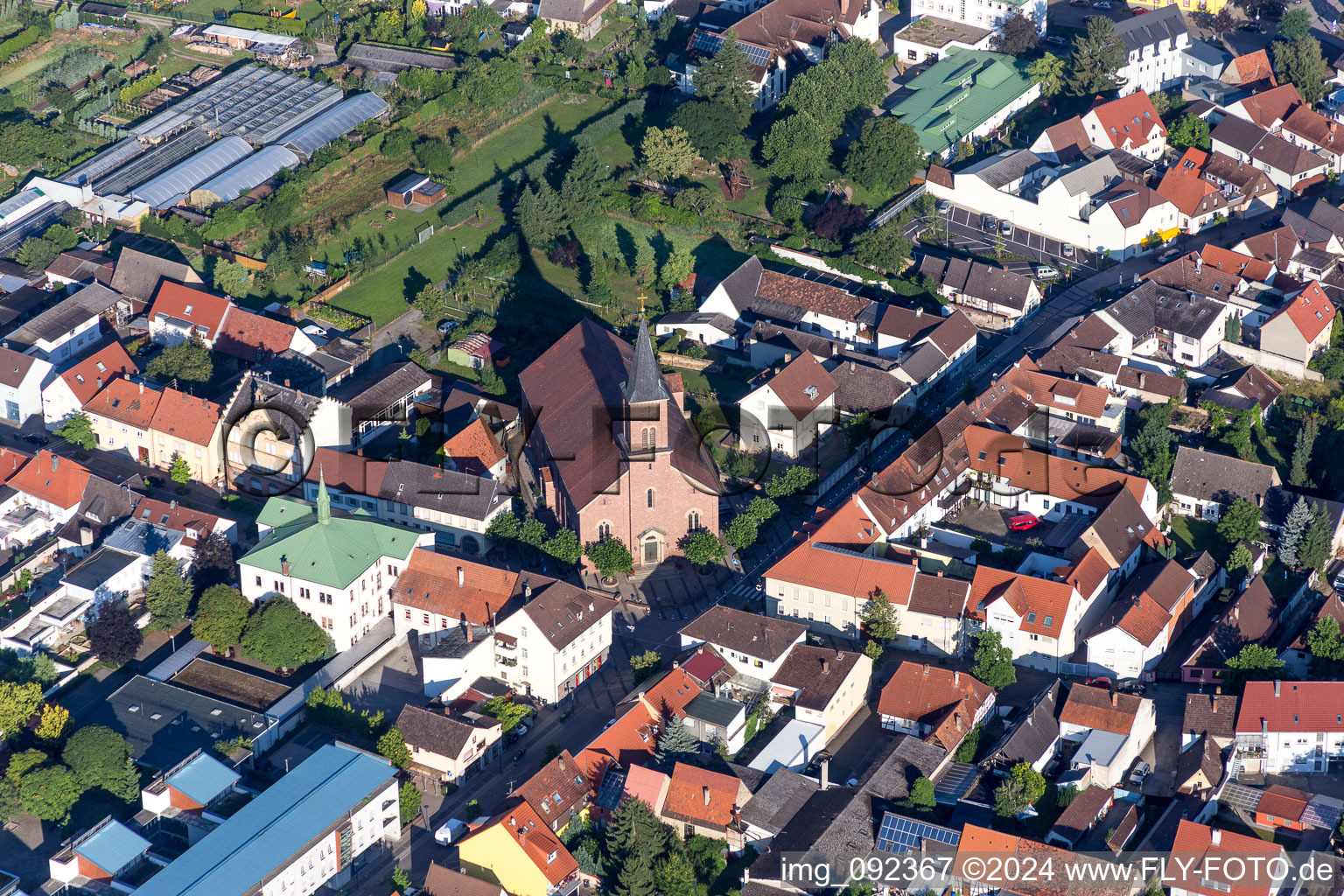 Aerial view of Church building Evangel. Kirche Wiesental in the district Wiesental in Waghaeusel in the state Baden-Wurttemberg, Germany