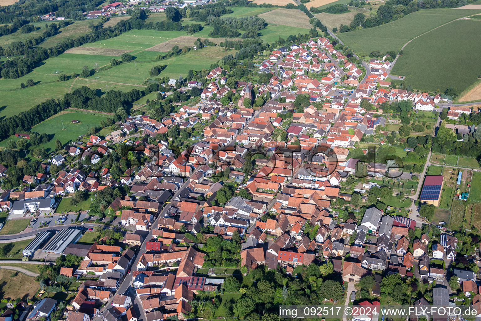 Aerial view of Village - view on the edge of agricultural fields and farmland in Rohrbach in the state Rhineland-Palatinate, Germany