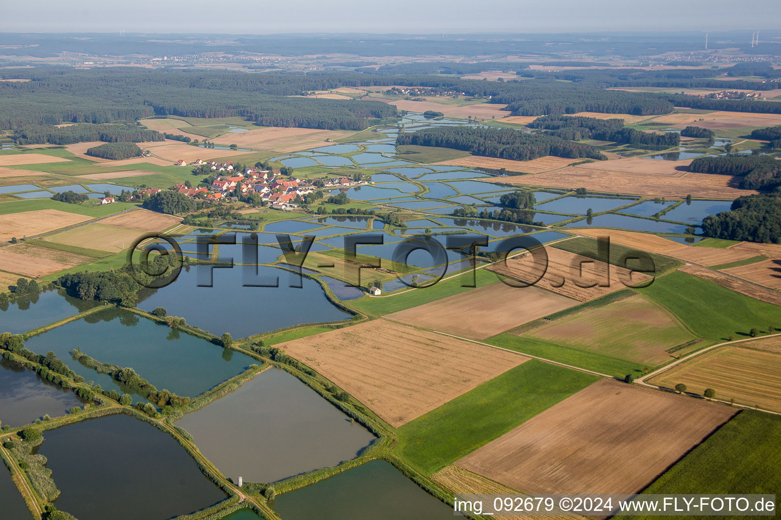 Ponds for fish farming von Karpfen in Grossen Bodenweier in Weisendorf in the state Bavaria, Germany