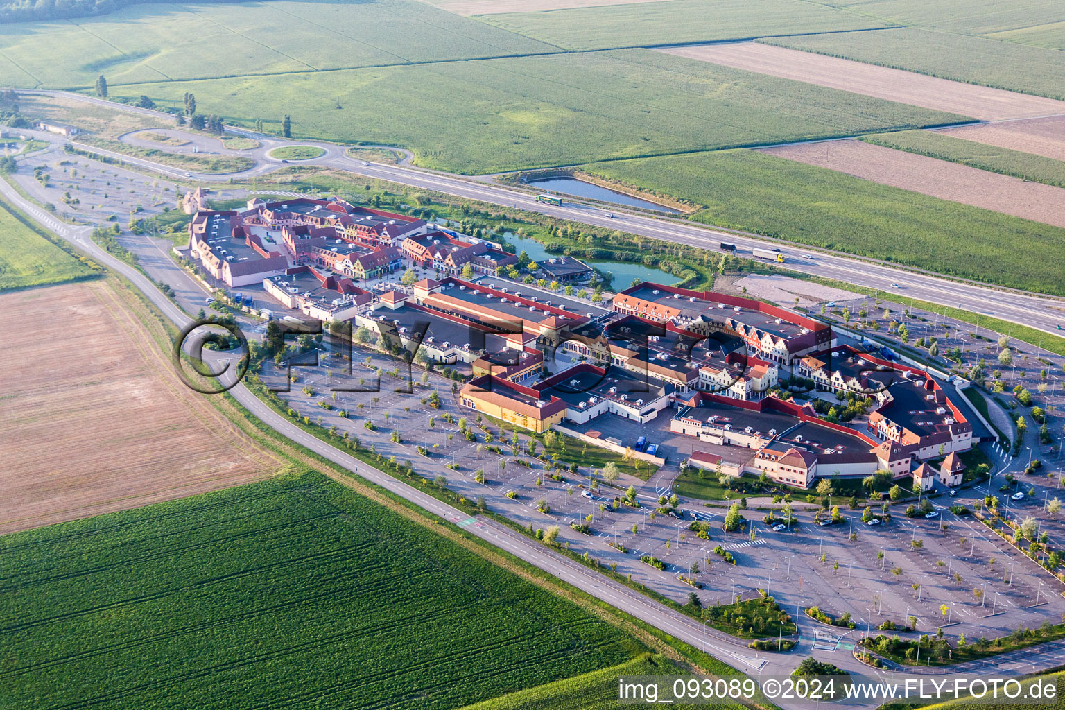 Building of the shopping center Roppenheim The Style Outlets in Roppenheim in Grand Est, France from the plane