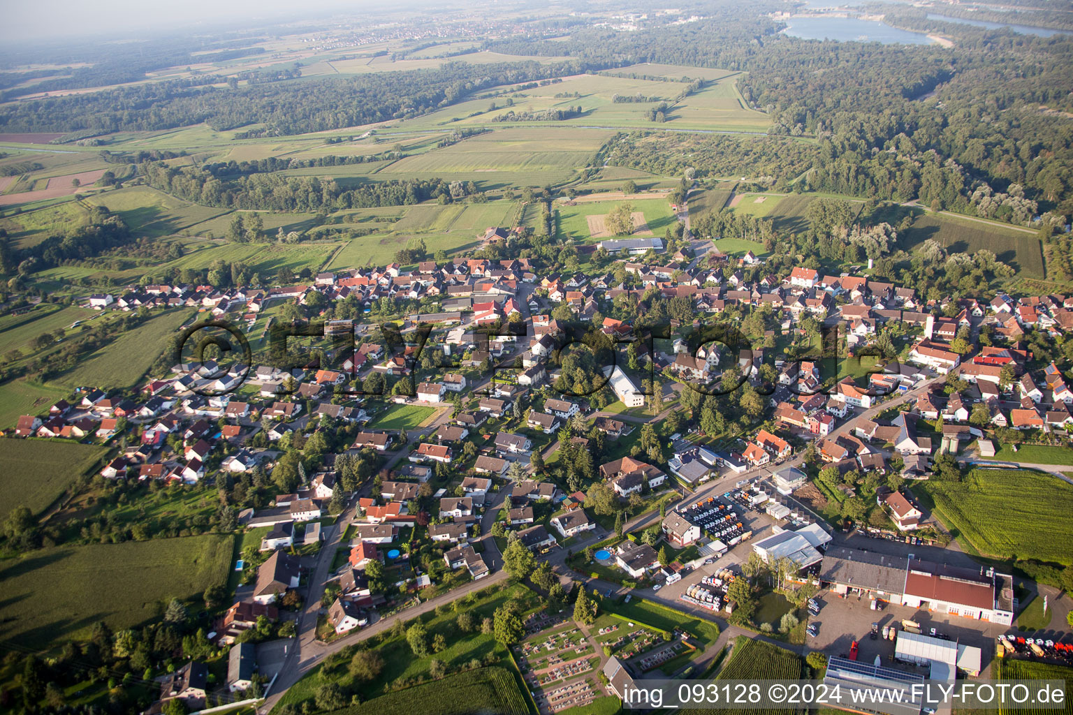 Village - view on the edge of agricultural fields and farmland in the district Helmlingen in Rheinau in the state Baden-Wurttemberg, Germany