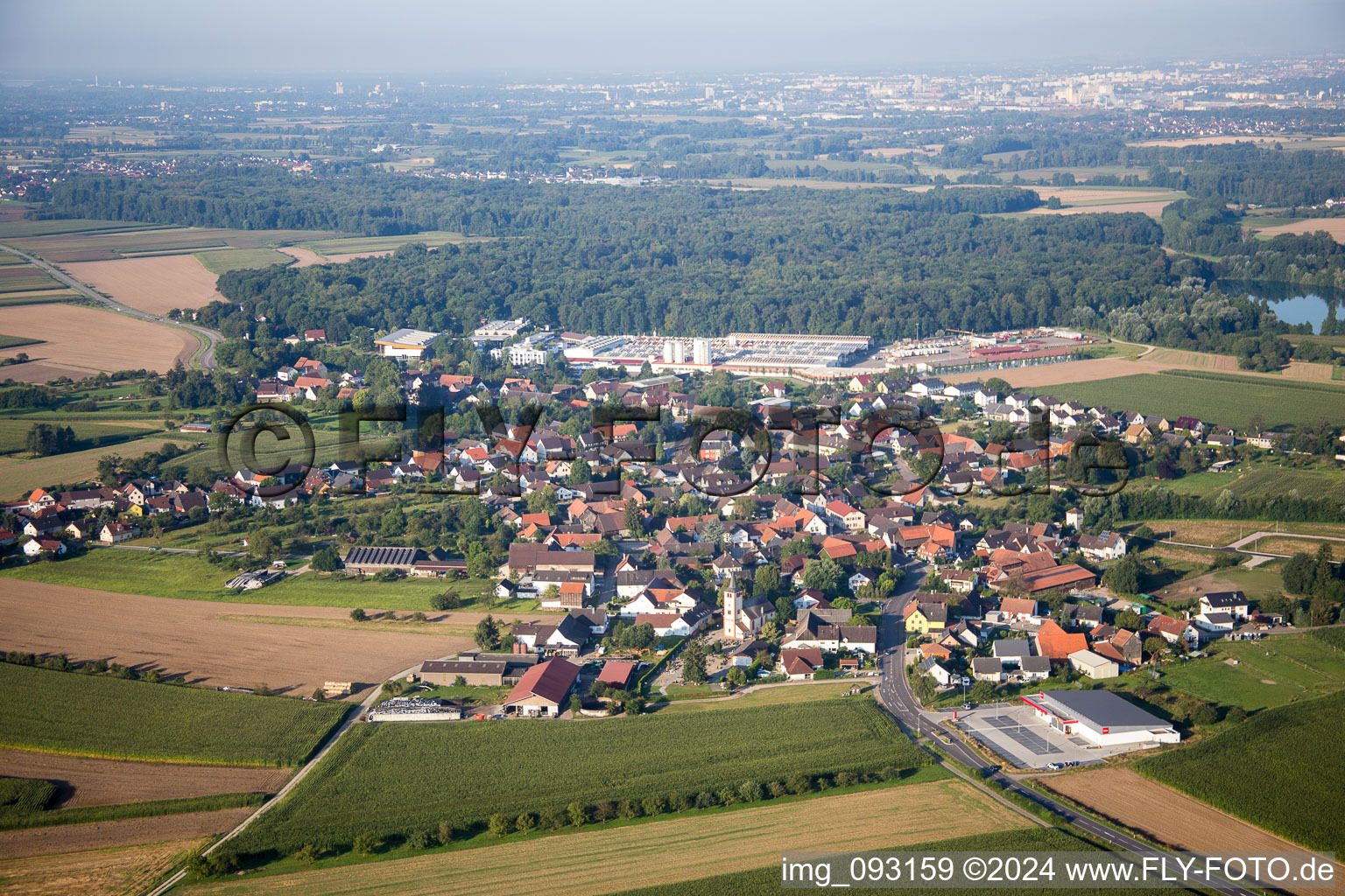 Village - view on the edge of agricultural fields and farmland in the district Linx in Rheinau in the state Baden-Wurttemberg, Germany