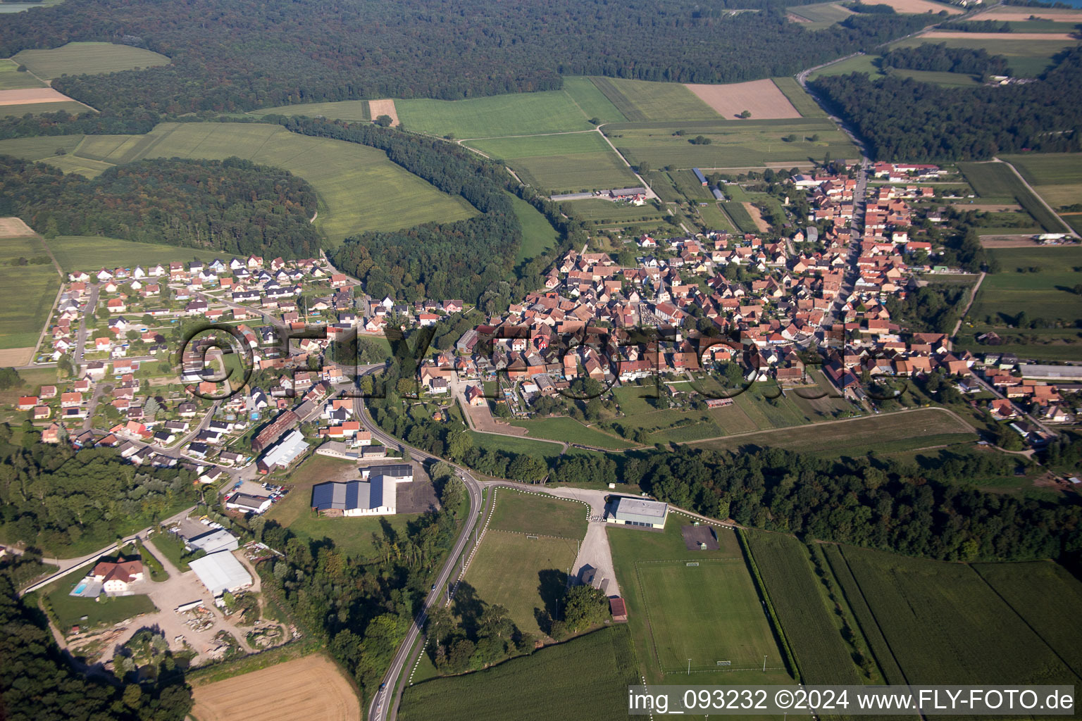 Village - view on the edge of agricultural fields and farmland in Herbsheim in Grand Est, France