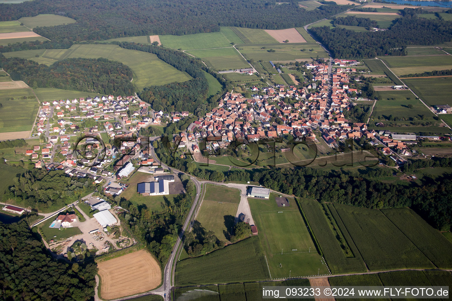 Aerial view of Village - view on the edge of agricultural fields and farmland in Herbsheim in Grand Est, France