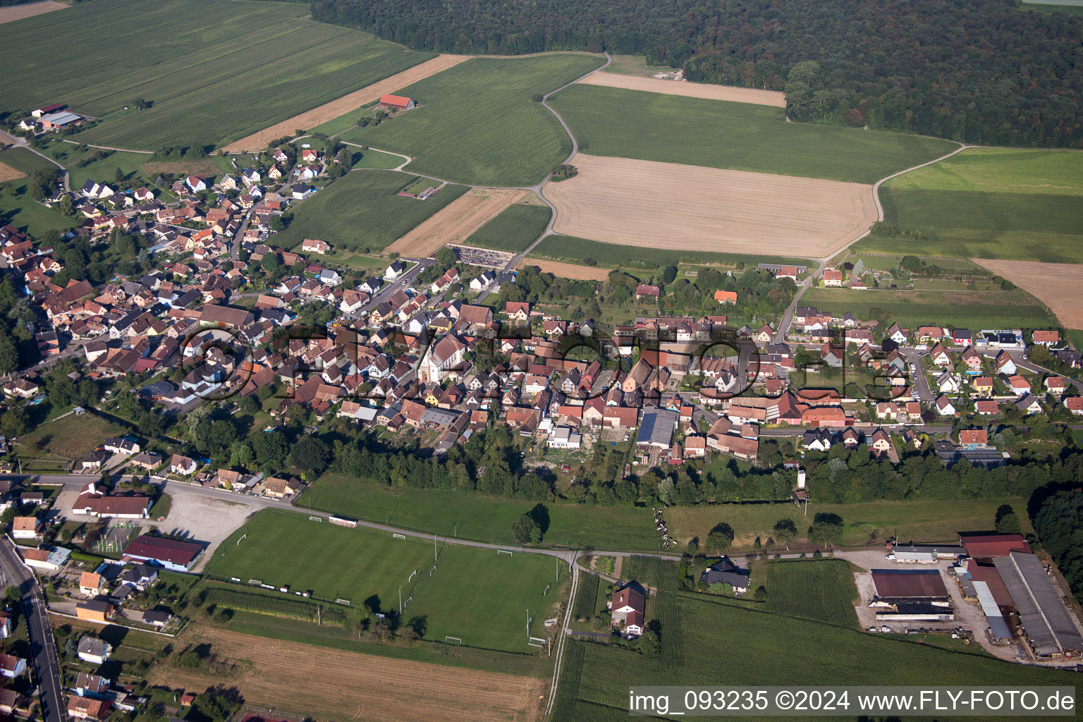 Oblique view of Village - view on the edge of agricultural fields and farmland in Herbsheim in Grand Est, France