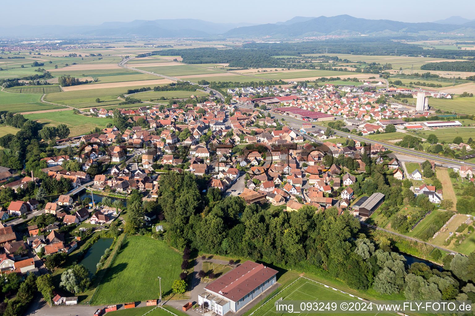 Village - view on the edge of agricultural fields and farmland in Kogenheim in Grand Est, France