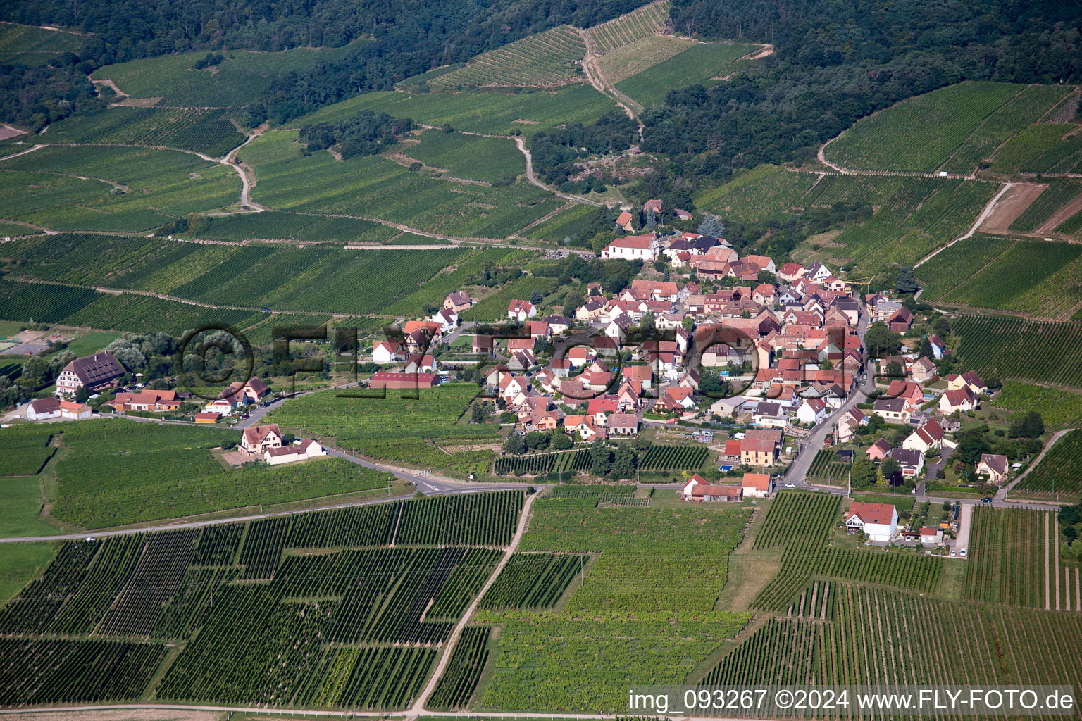 Aerial view of Village - view on the edge of agricultural fields and farmland in Dieffenthal in Grand Est, France