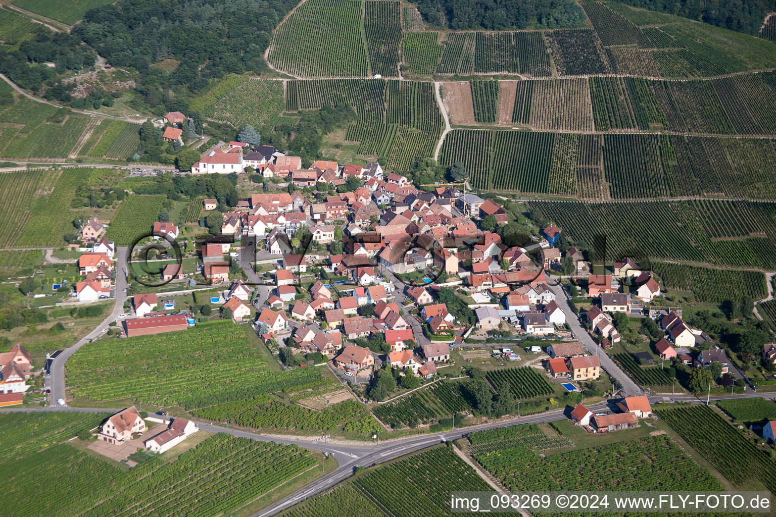 Aerial photograpy of Village - view on the edge of agricultural fields and farmland in Dieffenthal in Grand Est, France