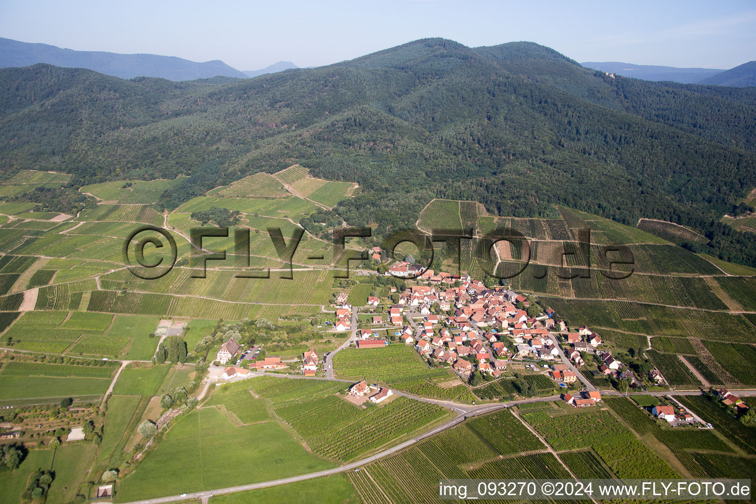 Oblique view of Village - view on the edge of agricultural fields and farmland in Dieffenthal in Grand Est, France