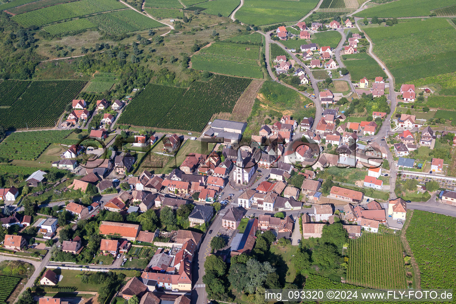 Aerial view of Village - view on the edge of agricultural fields and farmland in Rorschwihr in Grand Est, France