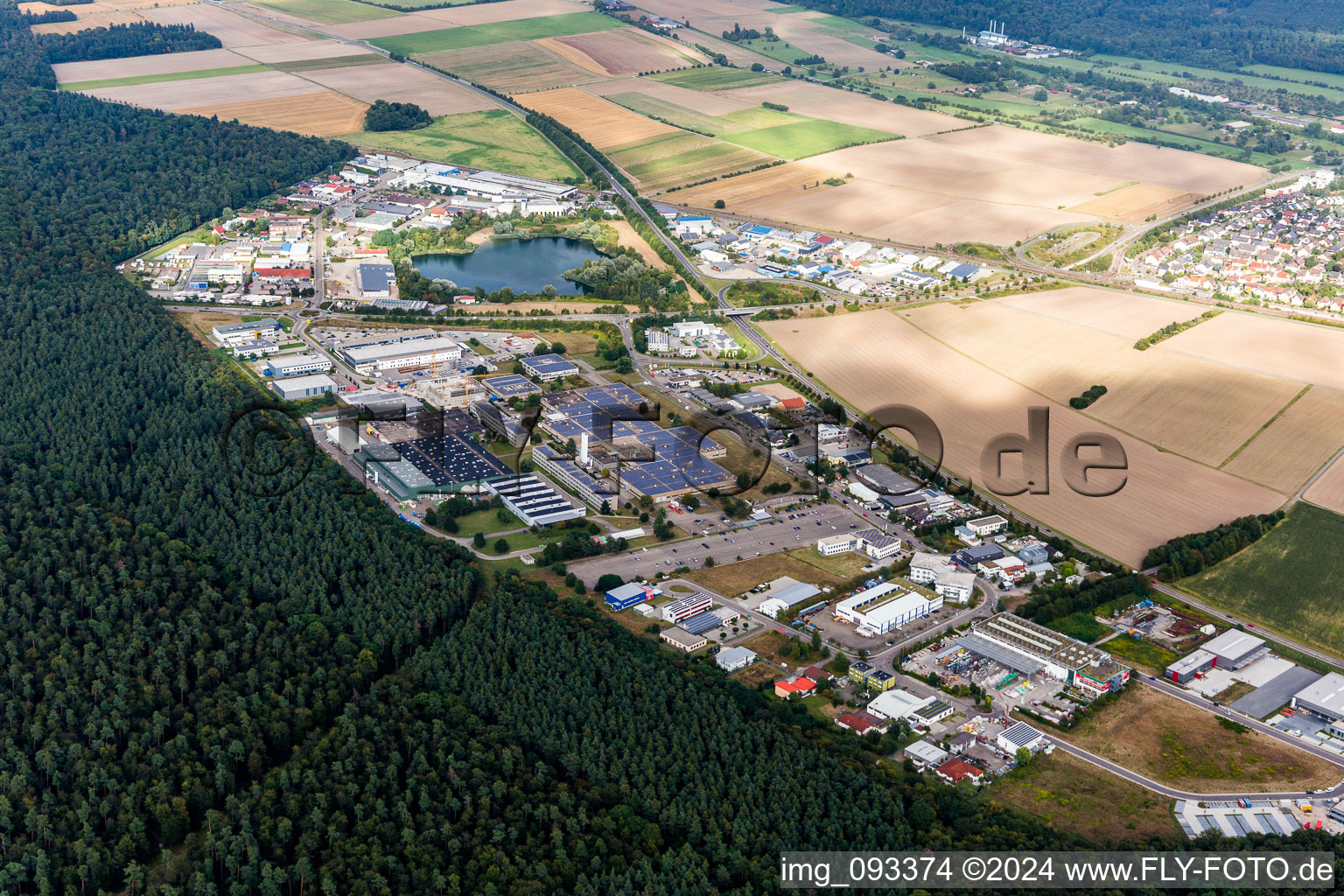 Aerial view of Industrial and commercial area with IWK Verpackungstechnik GmbH in Stutensee in the state Baden-Wurttemberg, Germany