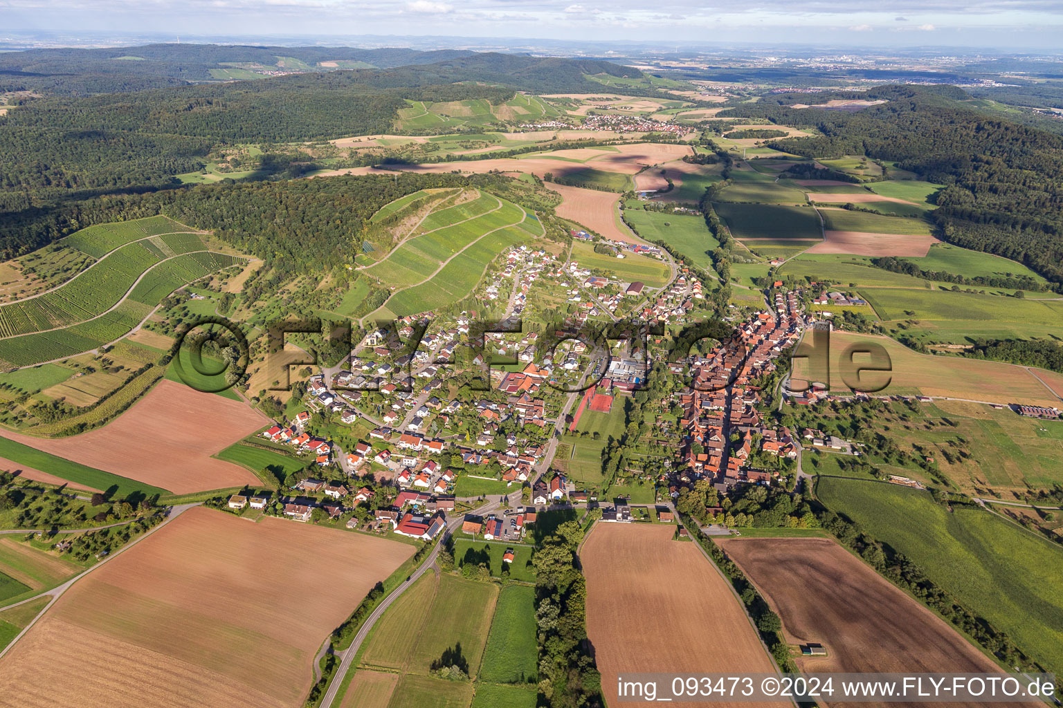 Village - view on the edge of agricultural fields and farmland in Schuetzingen in the state Baden-Wurttemberg, Germany