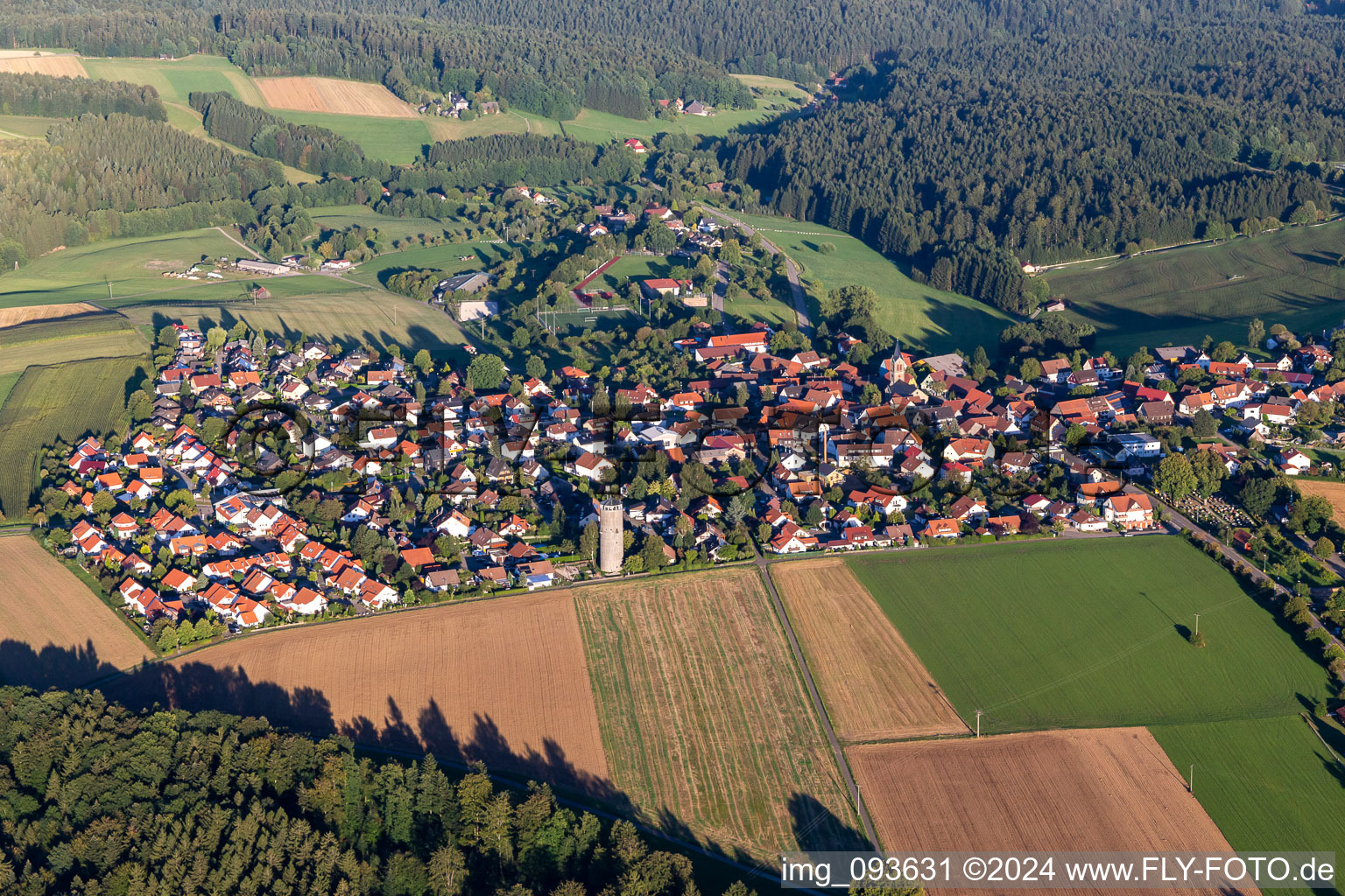 Aerial view of Village - view on the edge of agricultural fields and farmland in Kaisersbach in the state Baden-Wurttemberg, Germany
