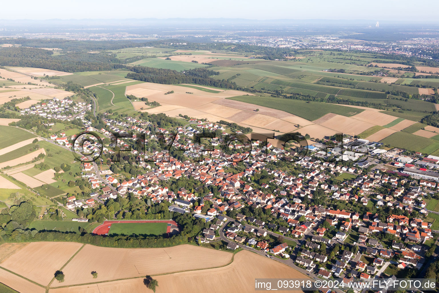 Village - view on the edge of agricultural fields and farmland in Bruchsal in the state Baden-Wurttemberg, Germany