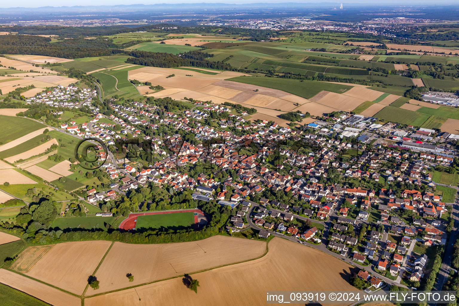 Aerial view of Village - view on the edge of agricultural fields and farmland in Bruchsal in the state Baden-Wurttemberg, Germany