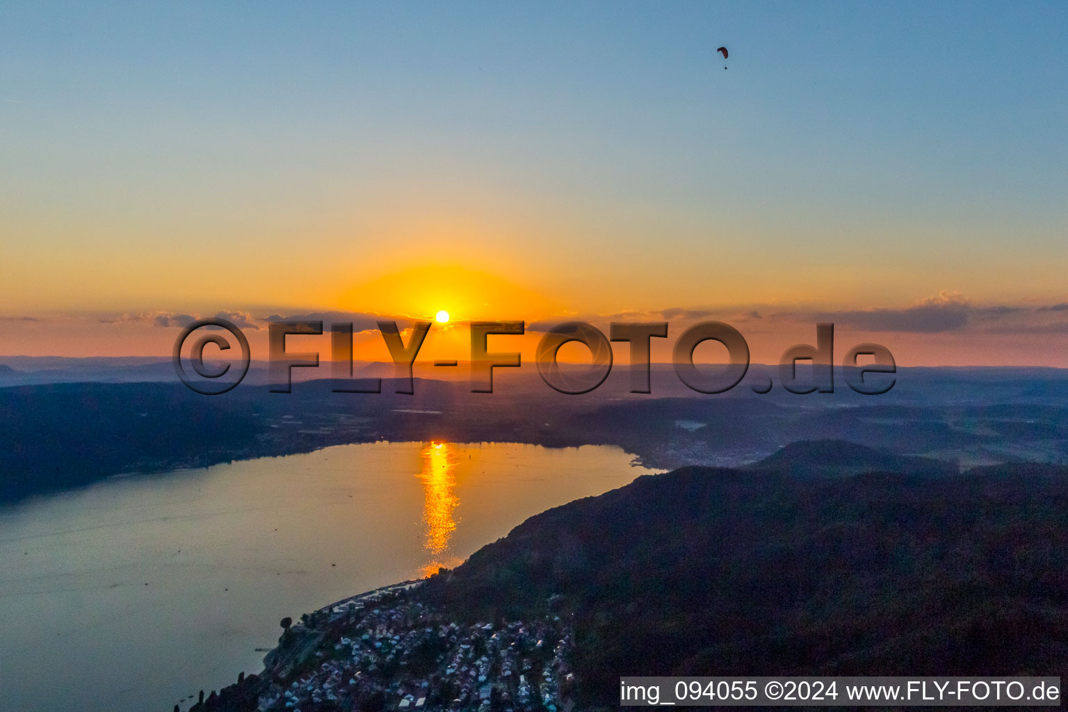 Sunset with paraglider over the countryside near Sipplingen/Bodensee in Bodman-Ludwigshafen in the state Baden-Wurttemberg